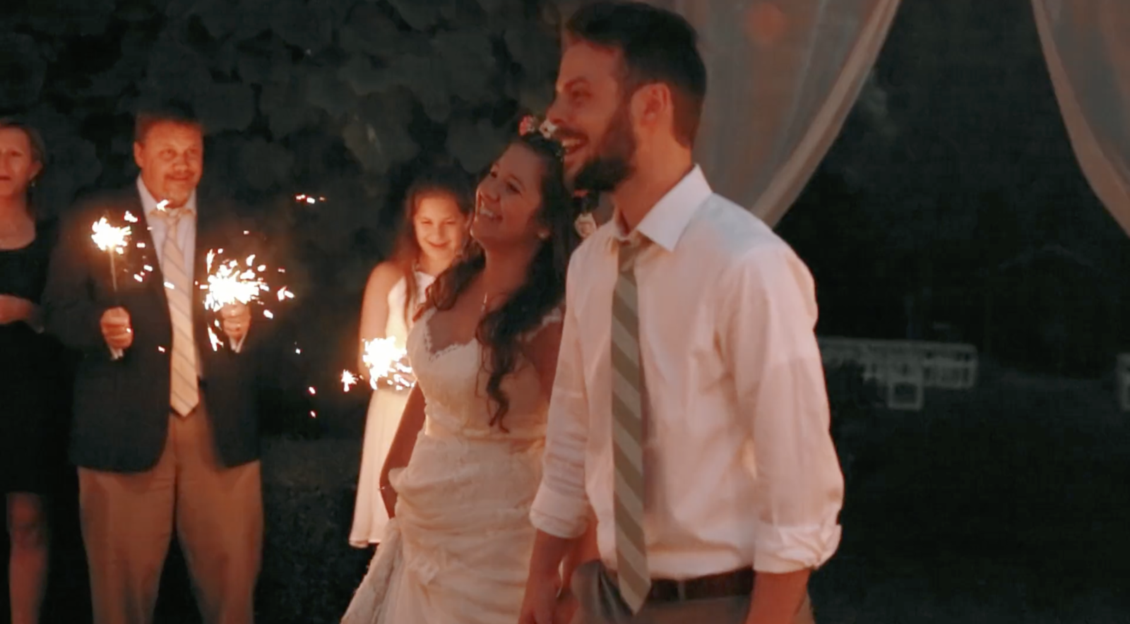 bride and groom exit reception with sparklers at jardin del sol