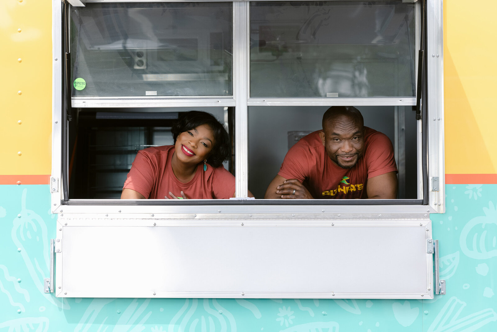 Husband and wife business owners in food truck