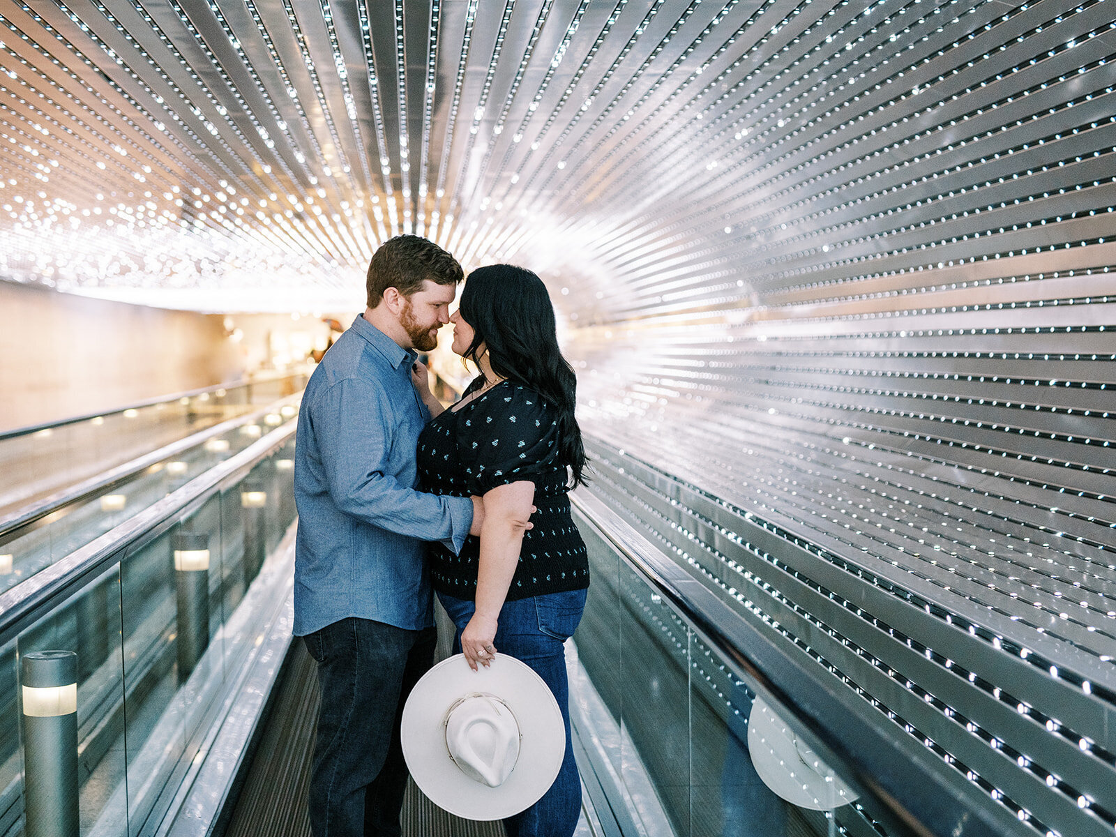 Couple in tunnel at national art gallery.