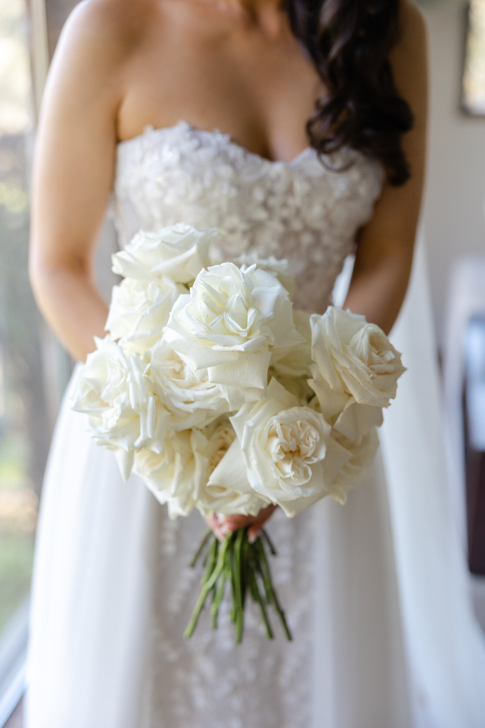 Classic wedding bouquet of white roses