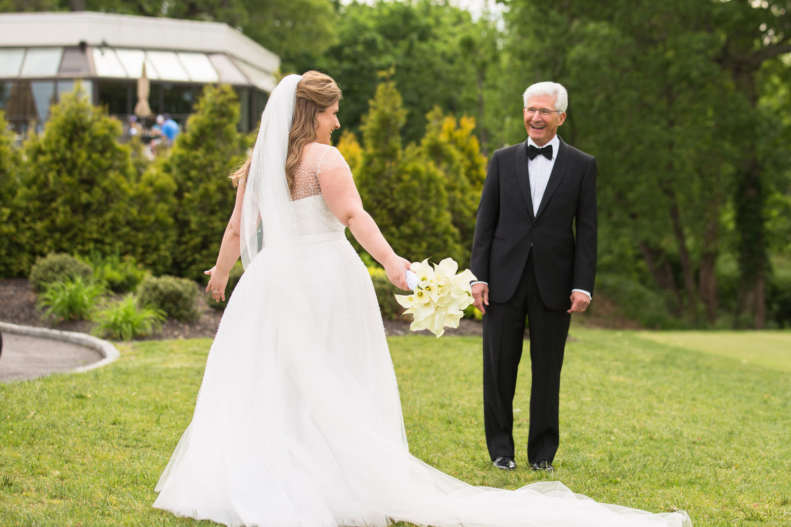 bride's first look with her father at Engineers Country Club