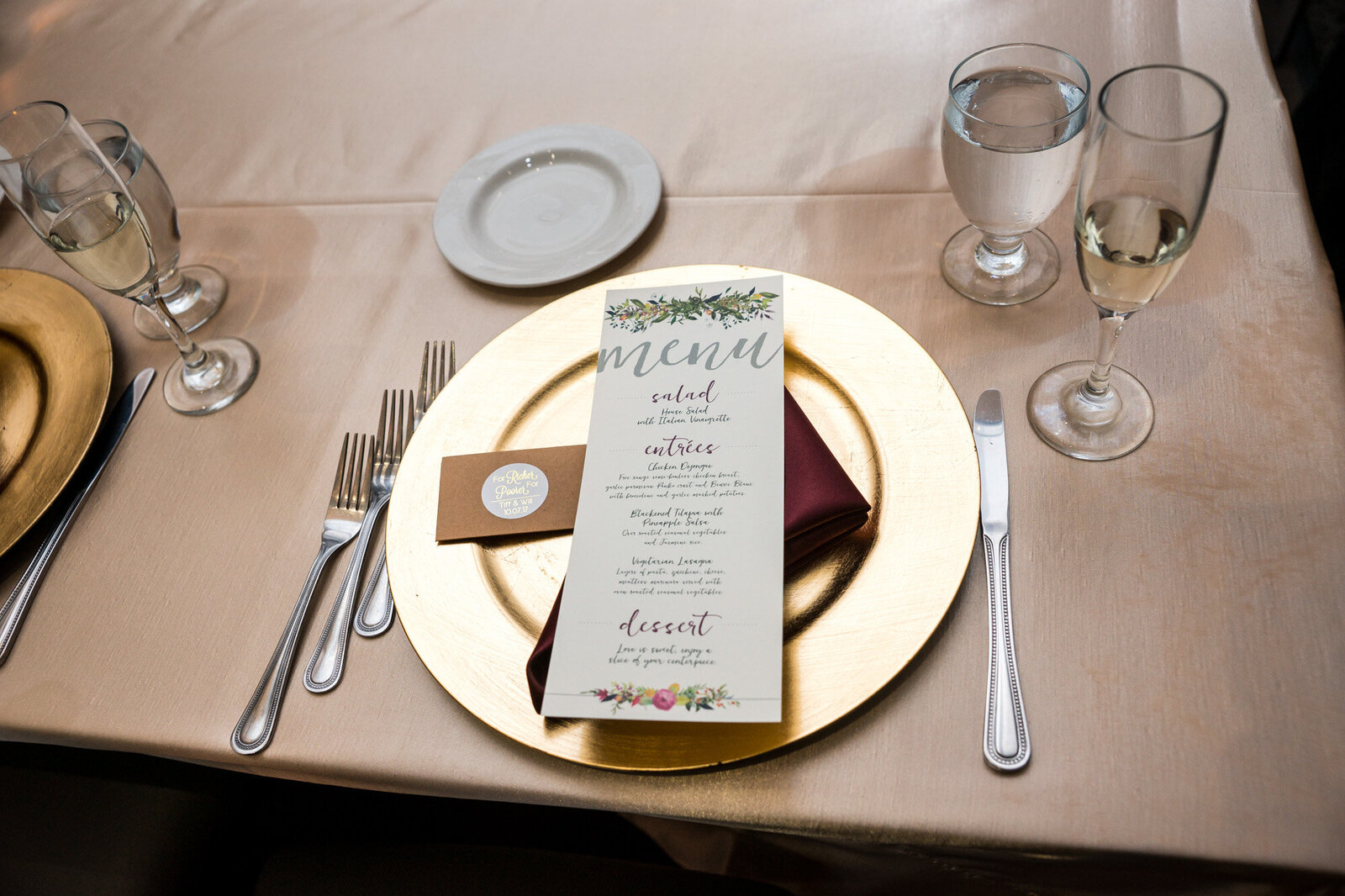 Wedding reception details with dinnerwares and glasses