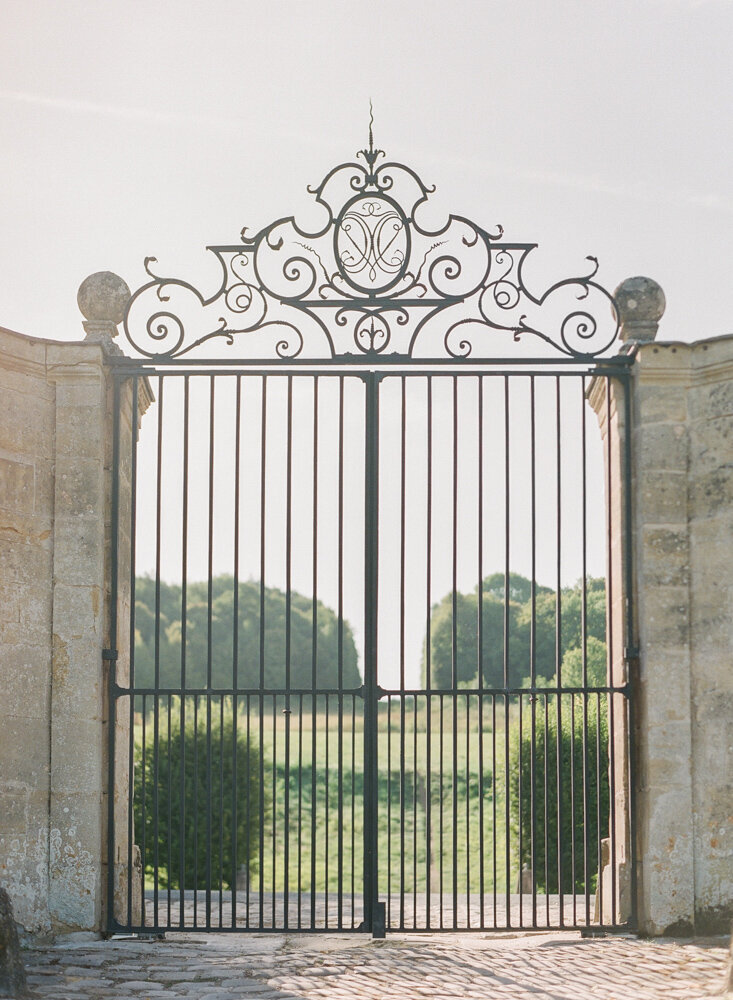 Large iron gate leading to parkland