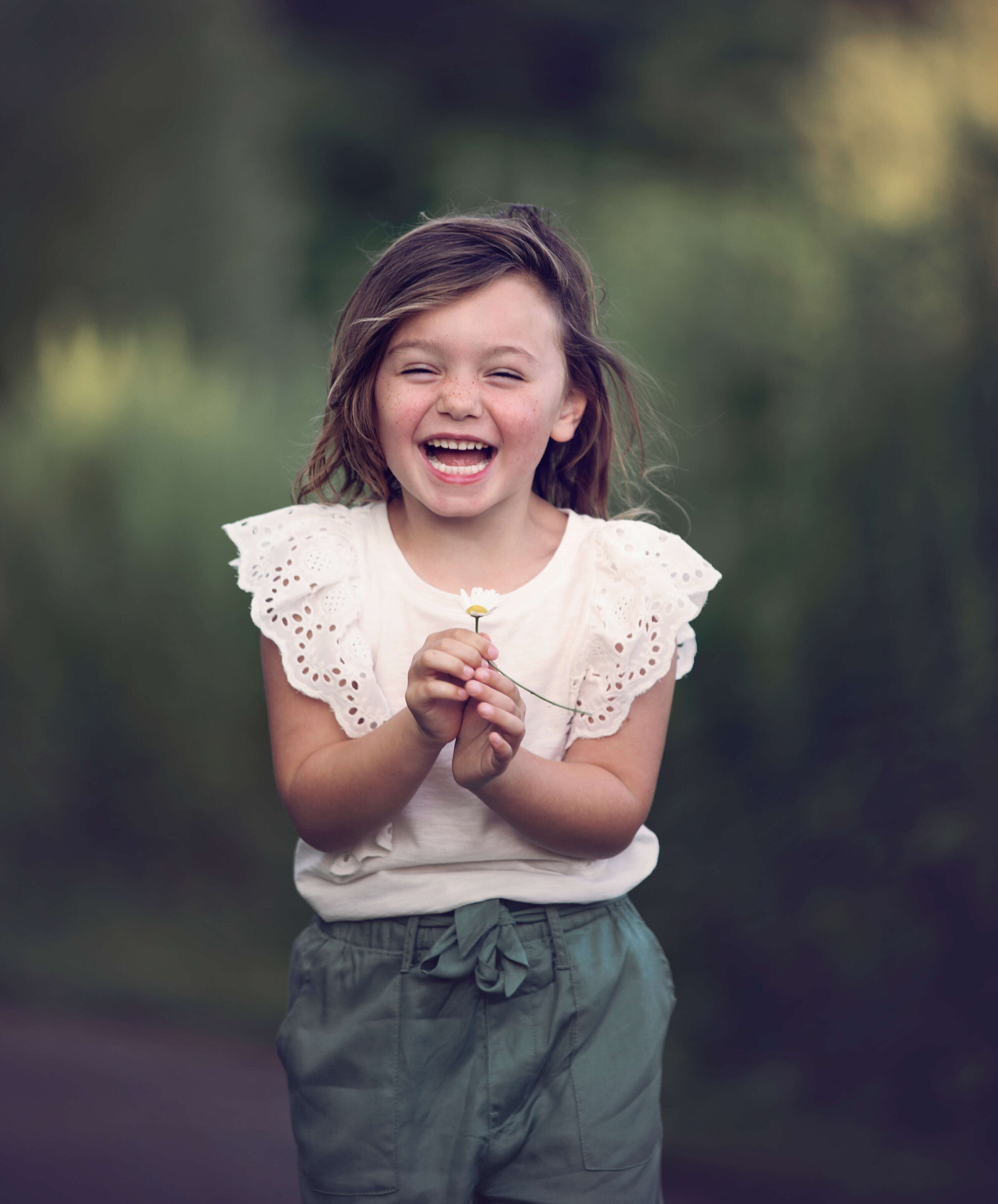 Photo of a little girl laughing at Bridger Park in Erie Pa