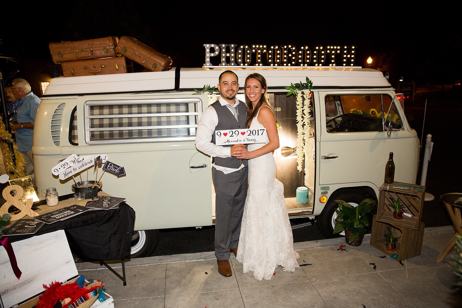 stunning night image with bride and groom at brick with vintage vw van