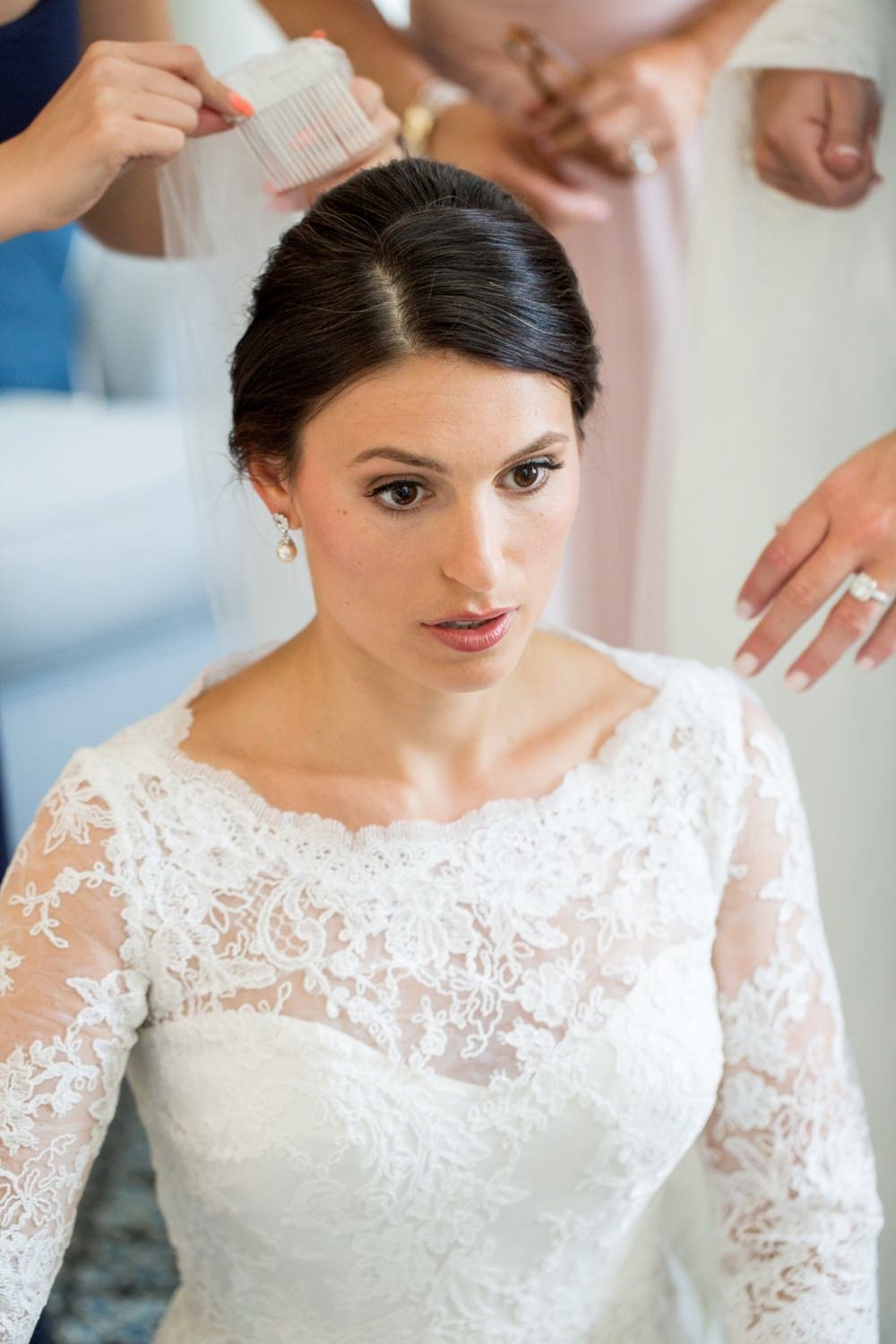 Classic bride getting ready for wedding at Eisenhower House in Newport, RI