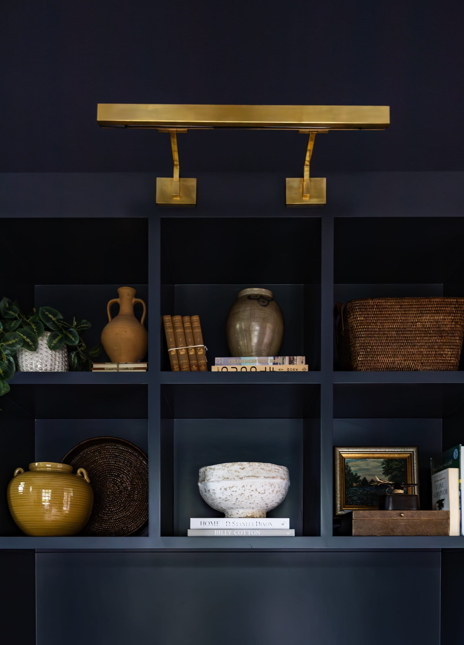 vision and hammer styling shelf dark blue with gold light fixture