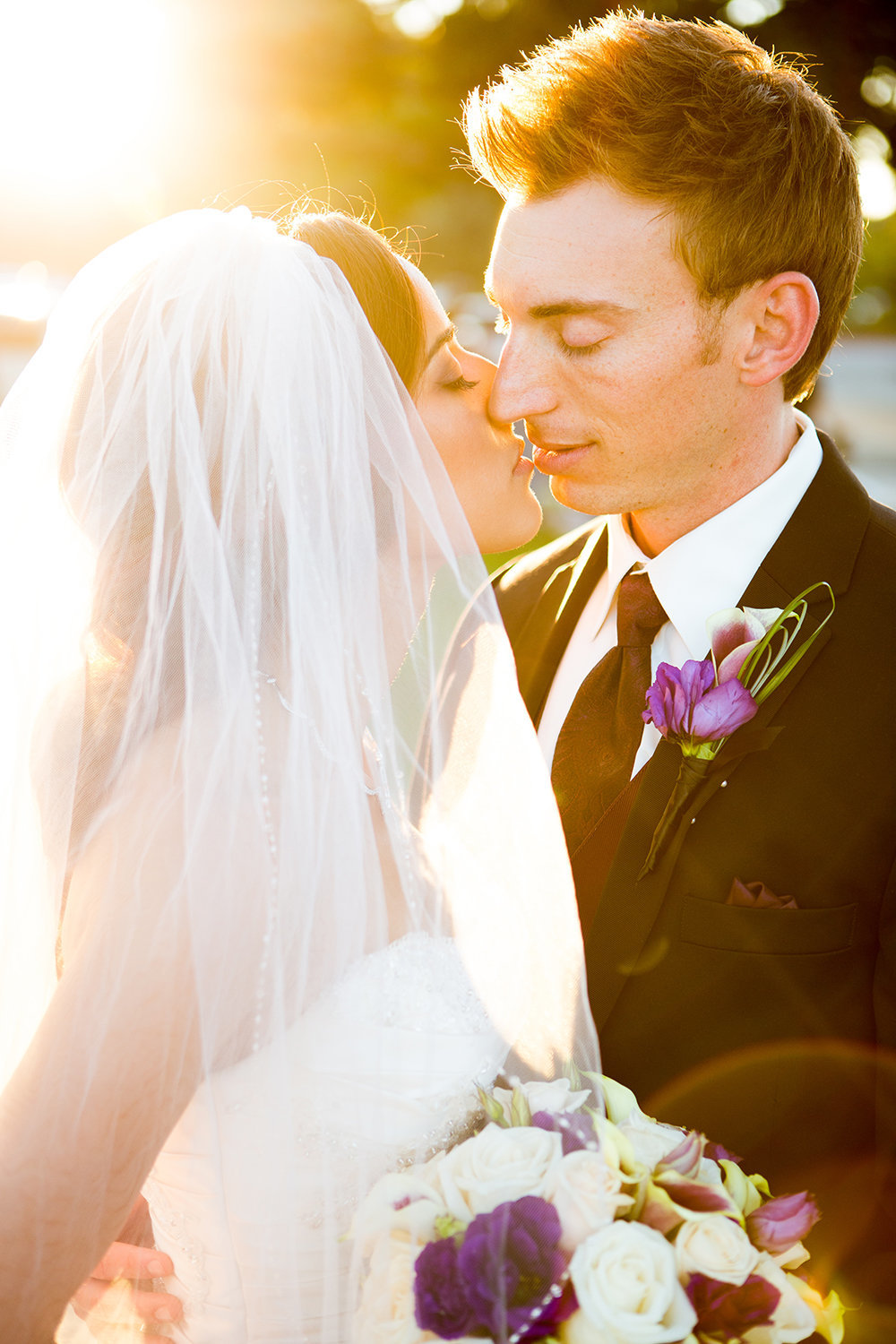 Lovely lighting in a candid portrait of bride and groom