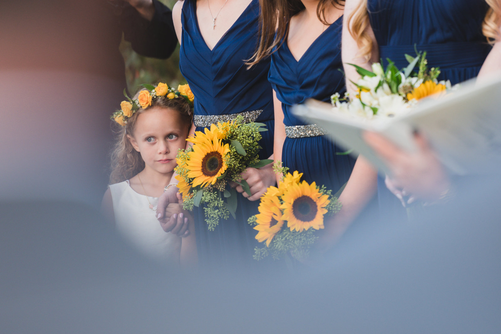 photo of flower girl and bouquets from wedding at Three Village Inn
