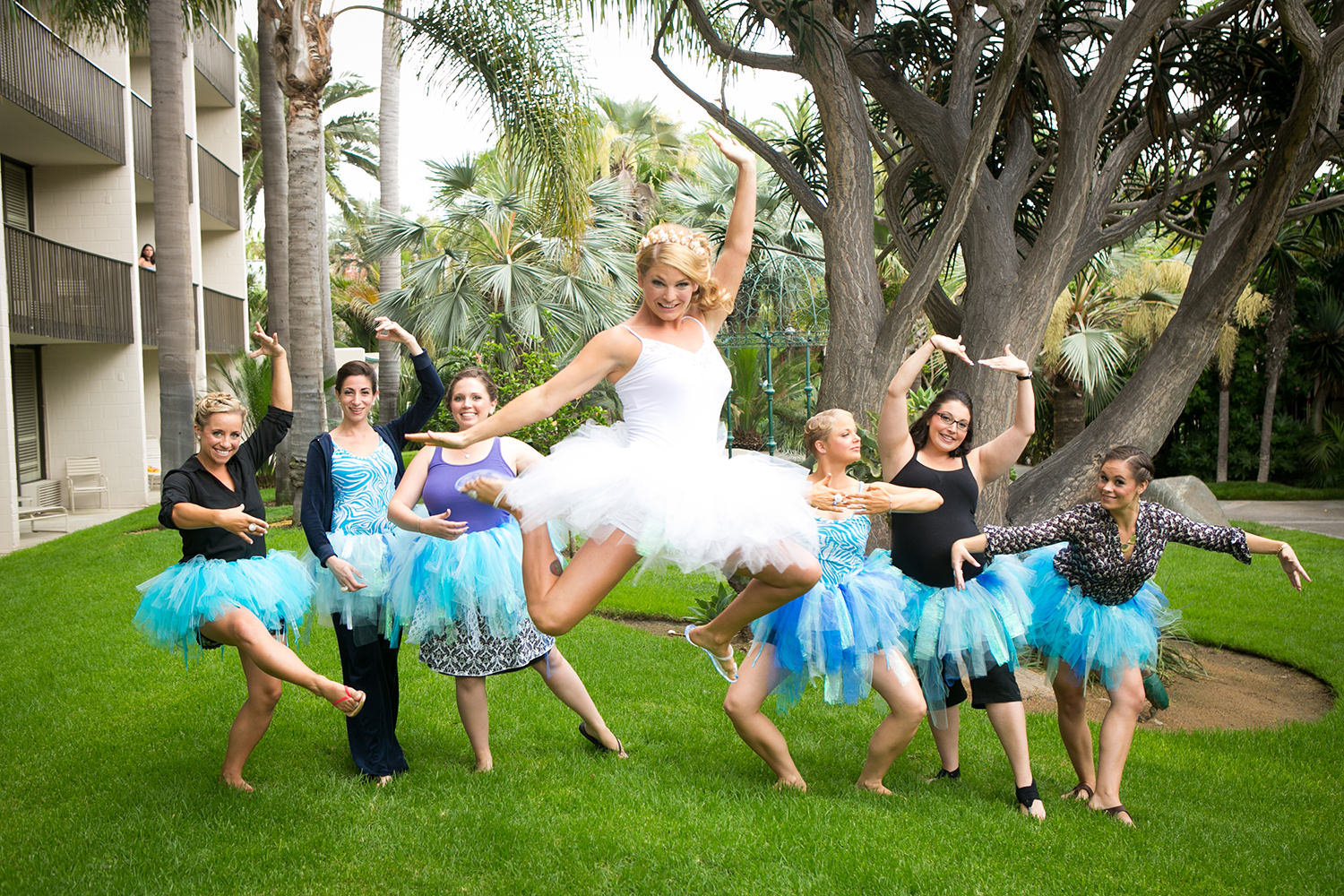 bride and bridesmaids jumping in the air