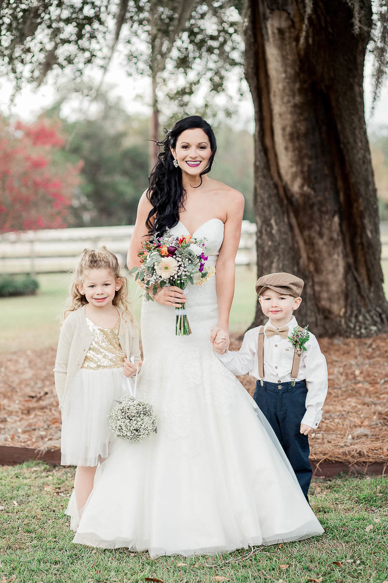 Bride poses with ring bearer and flower girl, Boals Farm, Charleston Wedding Photographer.