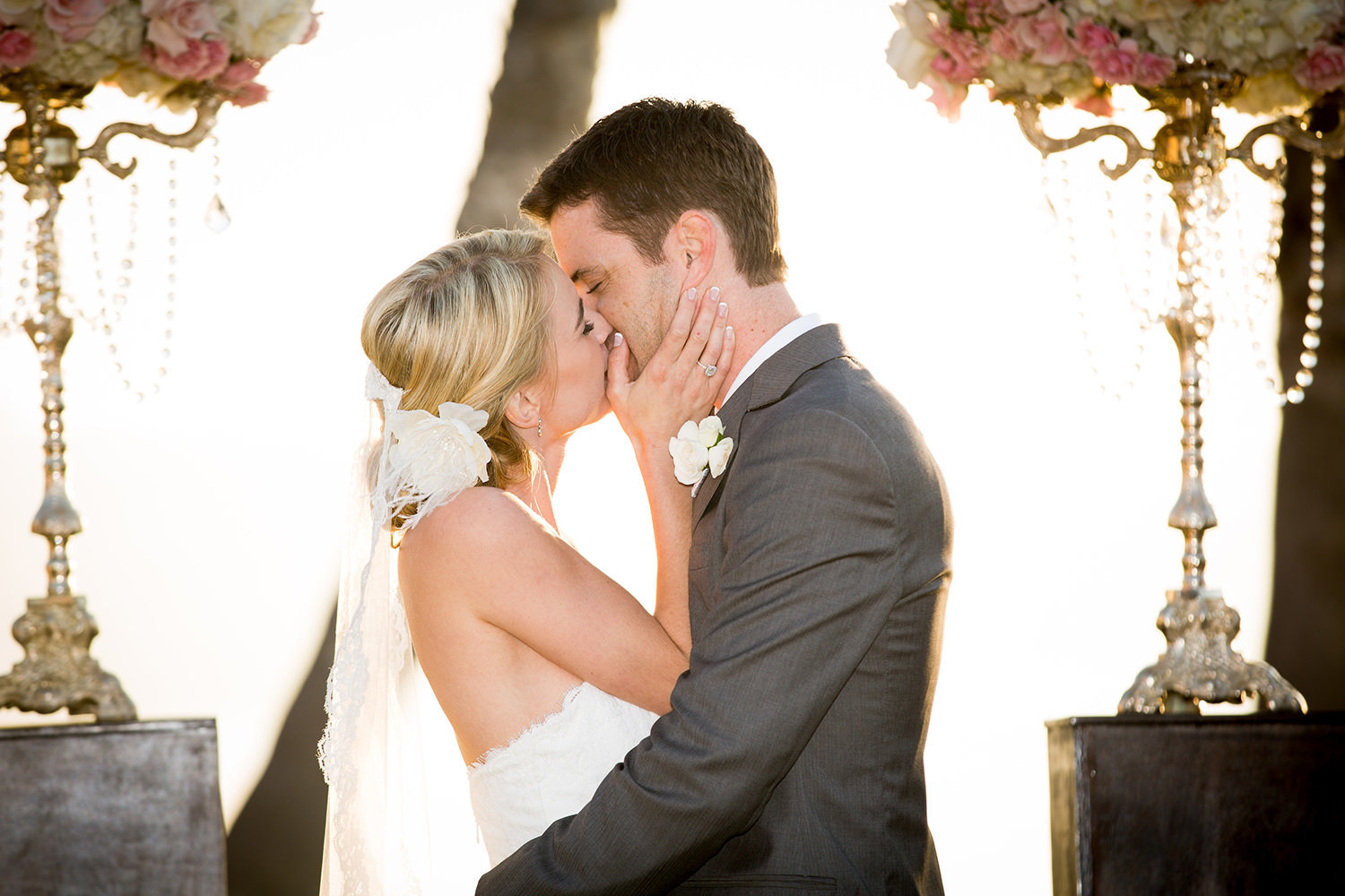 first kiss with bride and groom