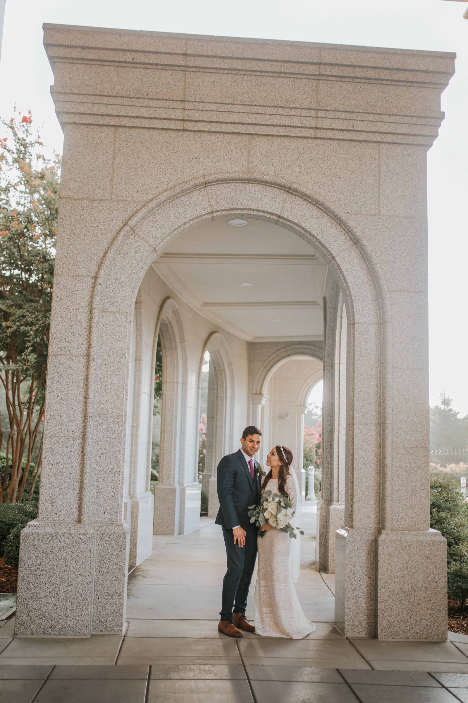 Sacramento Wedding Photographer captures bride and groom outside of Sacramento LDS Temple