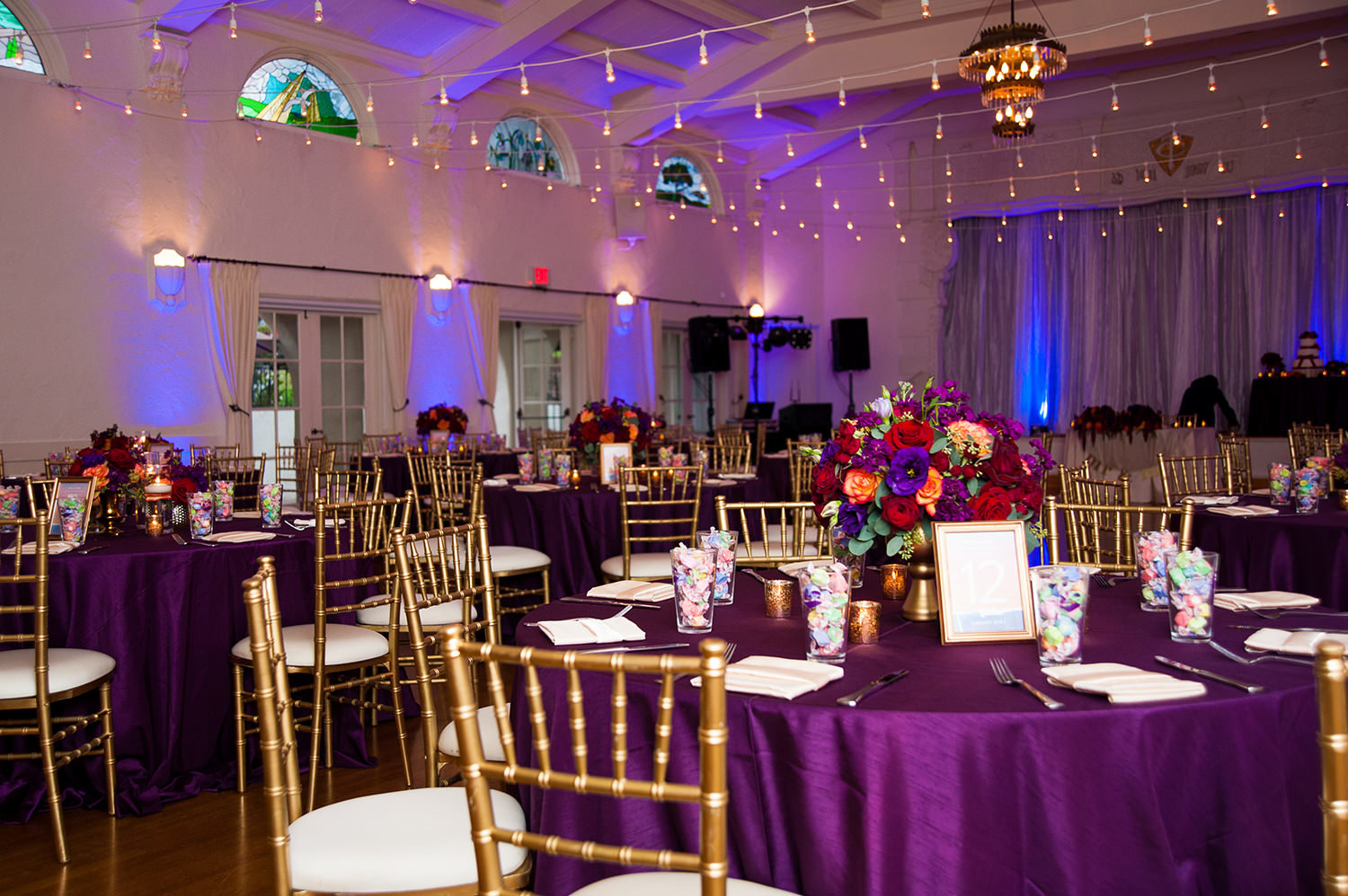 reception room with purple tables