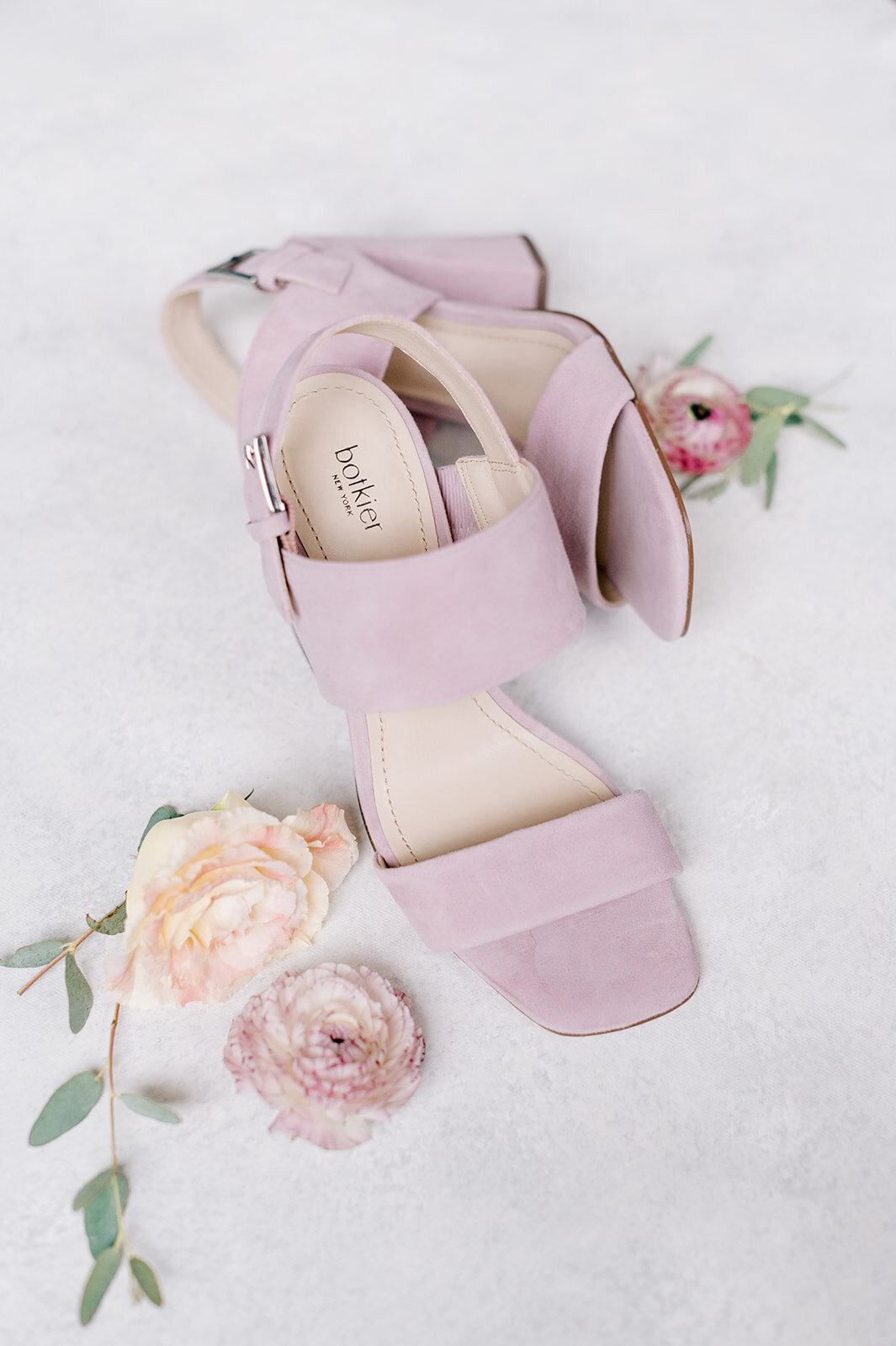 Pink suede wedding shoes at Trail Creek Cabin Wedding taken by the Best Sun Valley Wedding Photographers