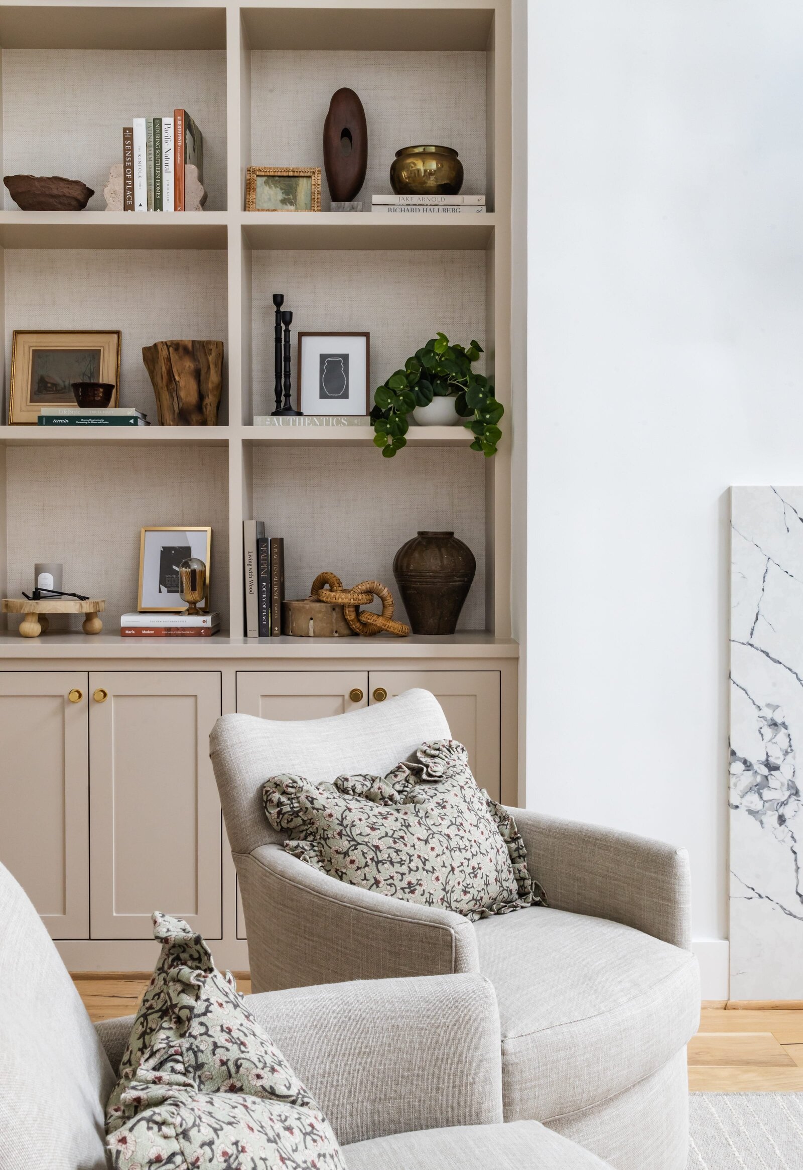 vision and hammer chairs and styled shelves with wooden accents