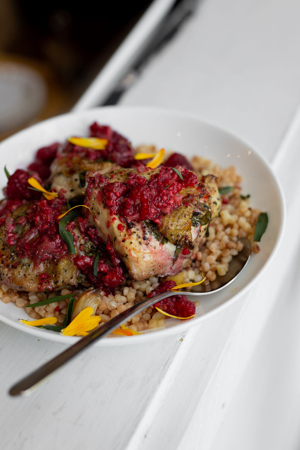 chicken - cous cous- raspberry sauce