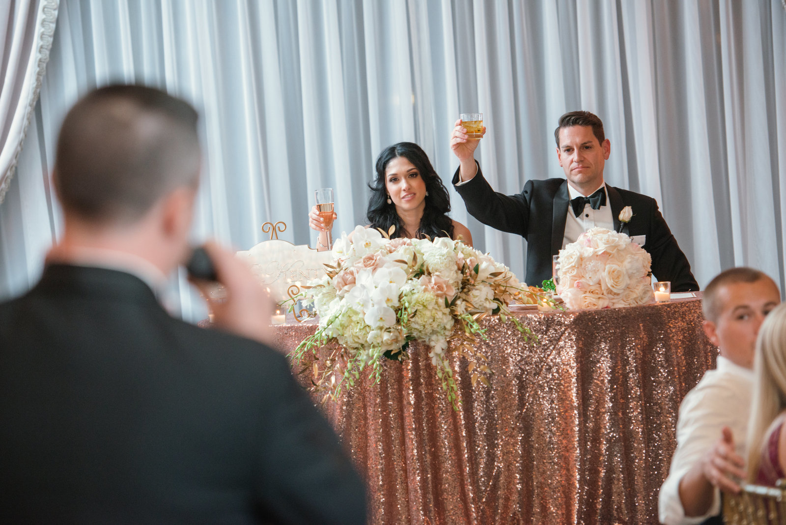 Bride and Groom toasts at Glen Cove Mansion