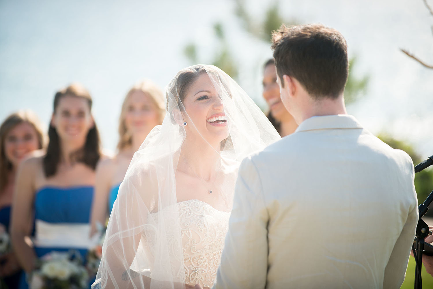 Bride laughing during her vows at a wedding in Seagrove Park Del Mar