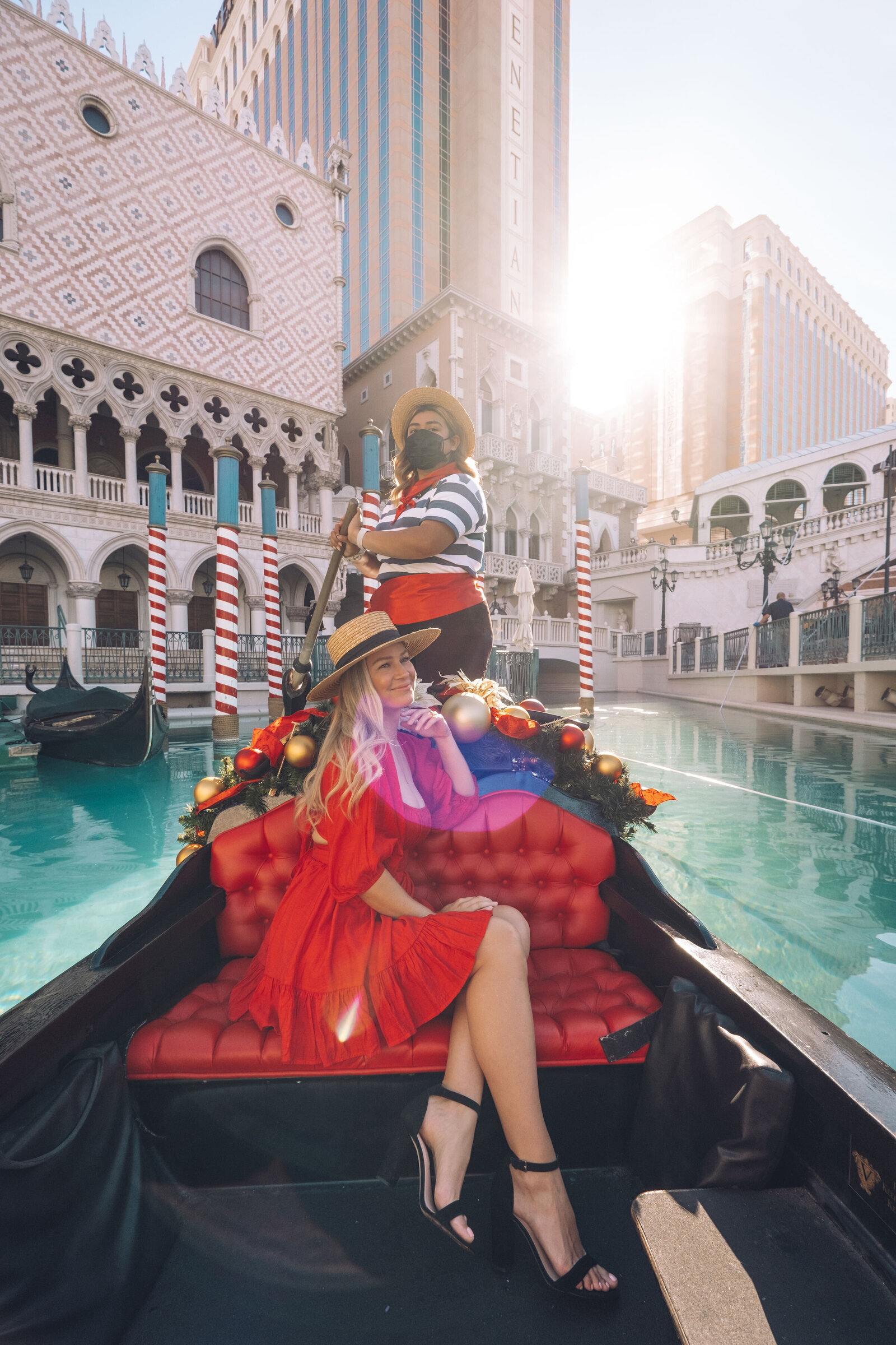 Branding photographer Chelsea Loren at the Venetian Hotel in Vegas with Kiersten Rich The Blonde Abroad travel blogger riding in a holiday gondola