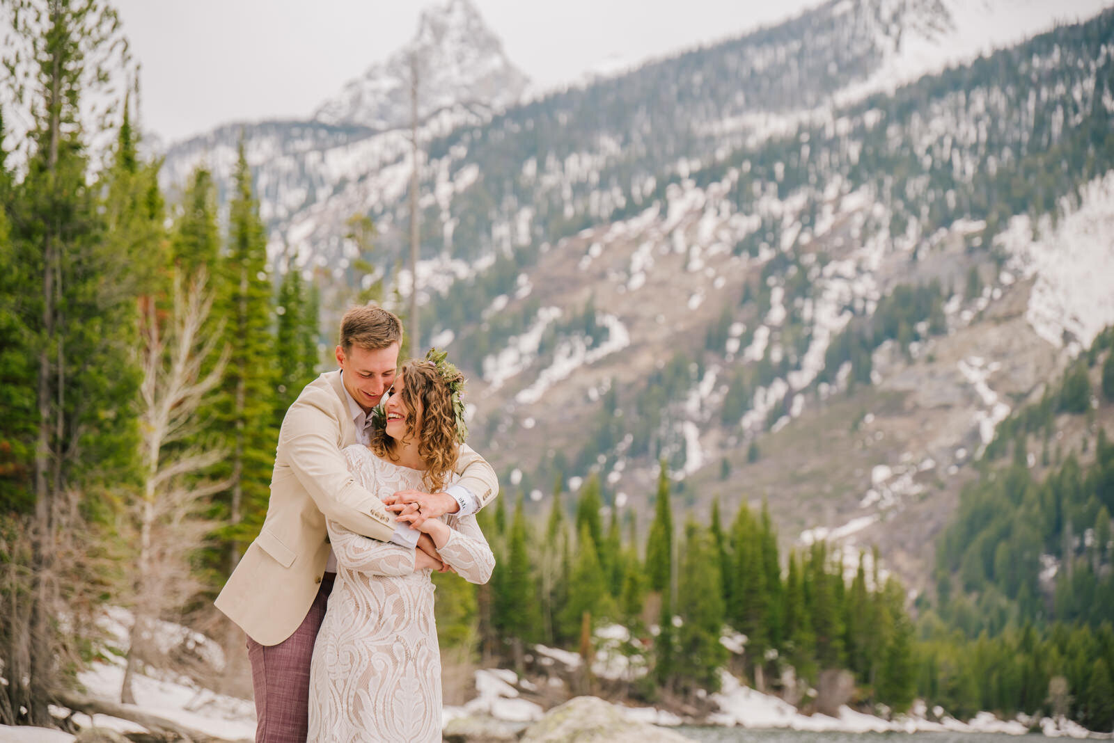 bride and groom hugging in Grand Teton National Park