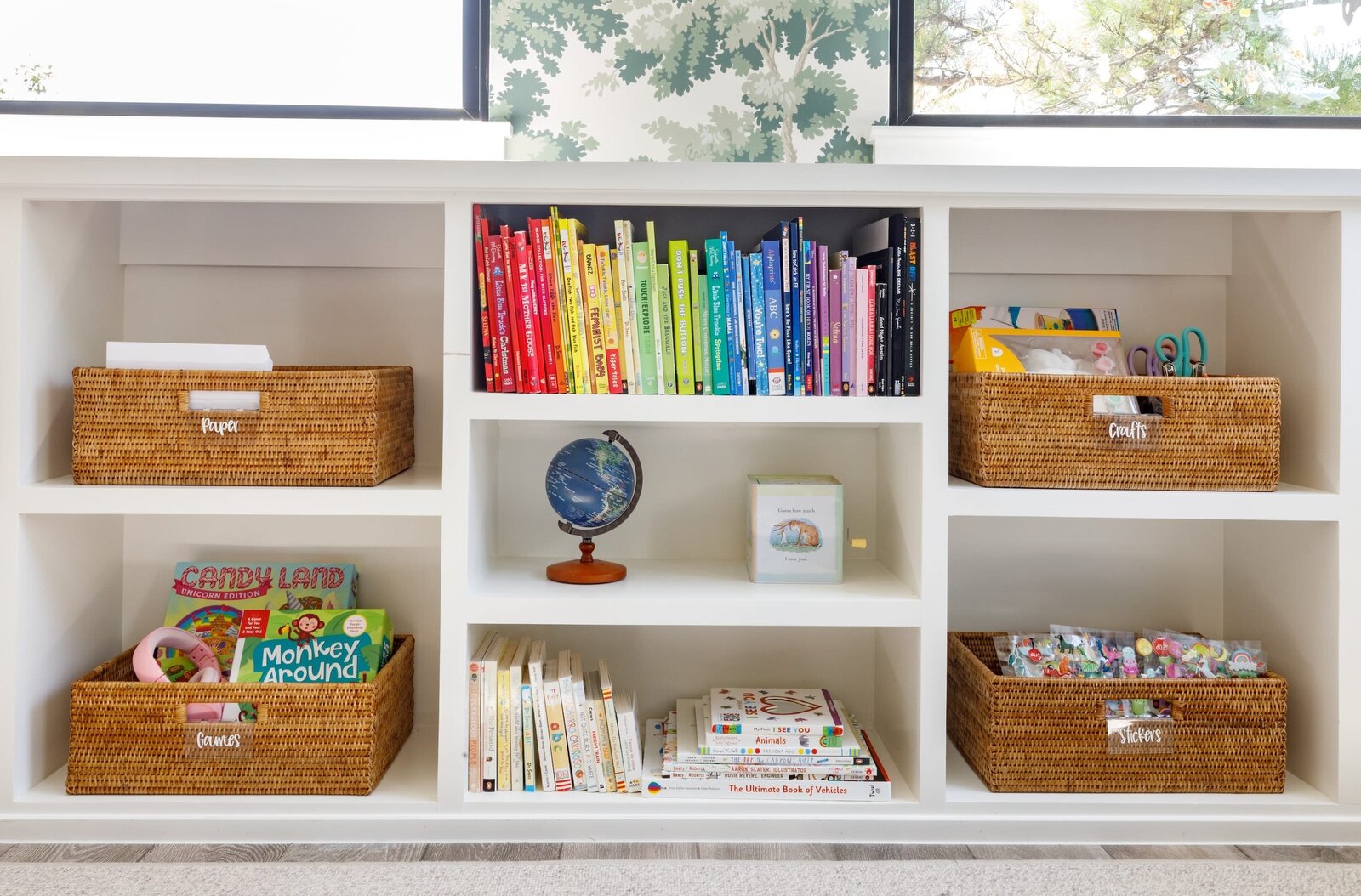 vision and hammer kids playroom shelves with toys and books
