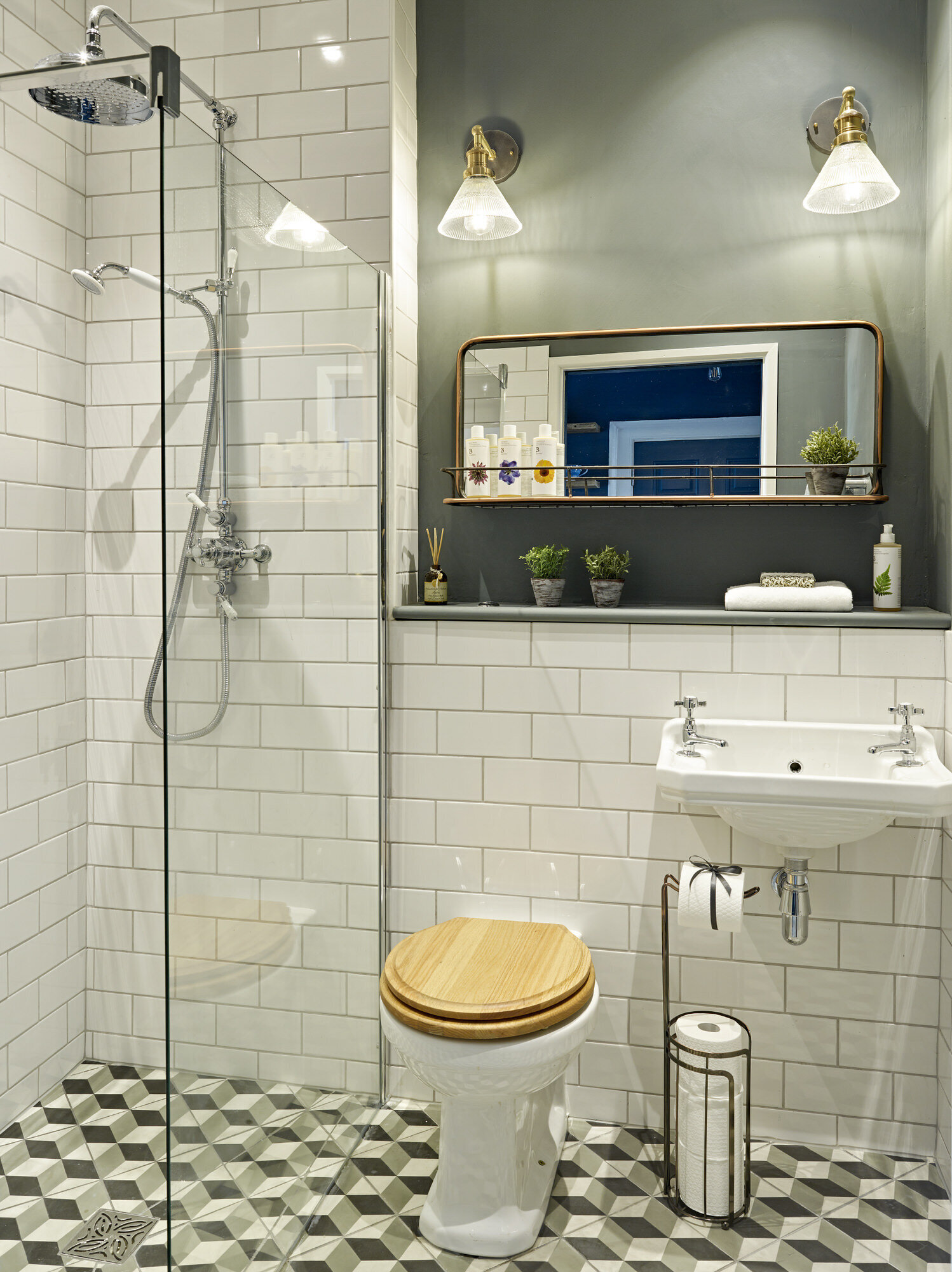 modern bathroom with white wall tile and pattern floor