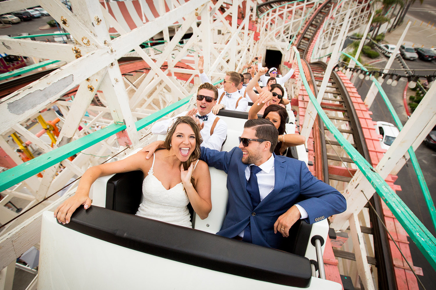 Big Dipper Mission Beach wedding photos bride and groom on coaster