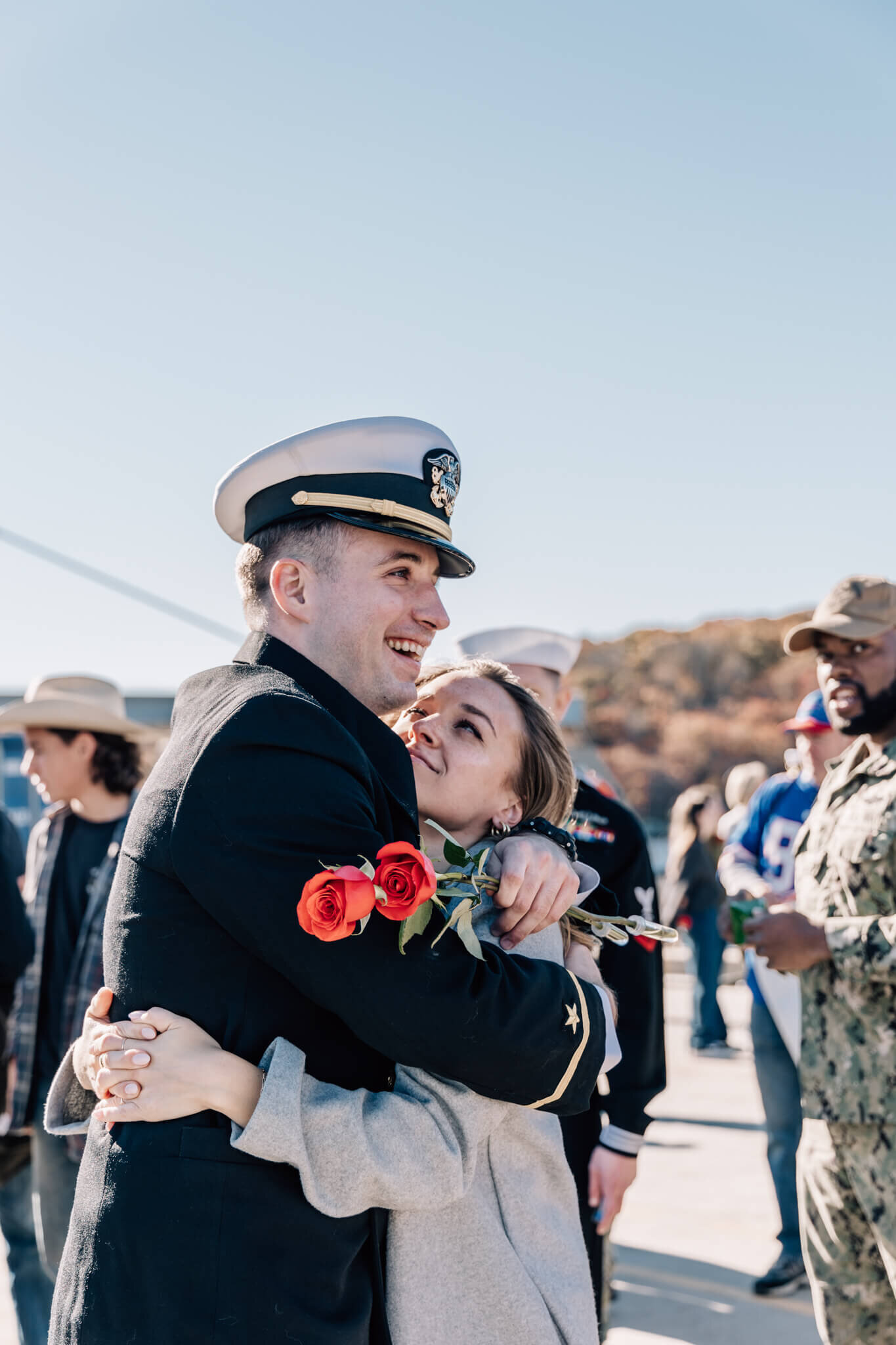 Naval officer reunites with partner at USS North Dakota homecoming..