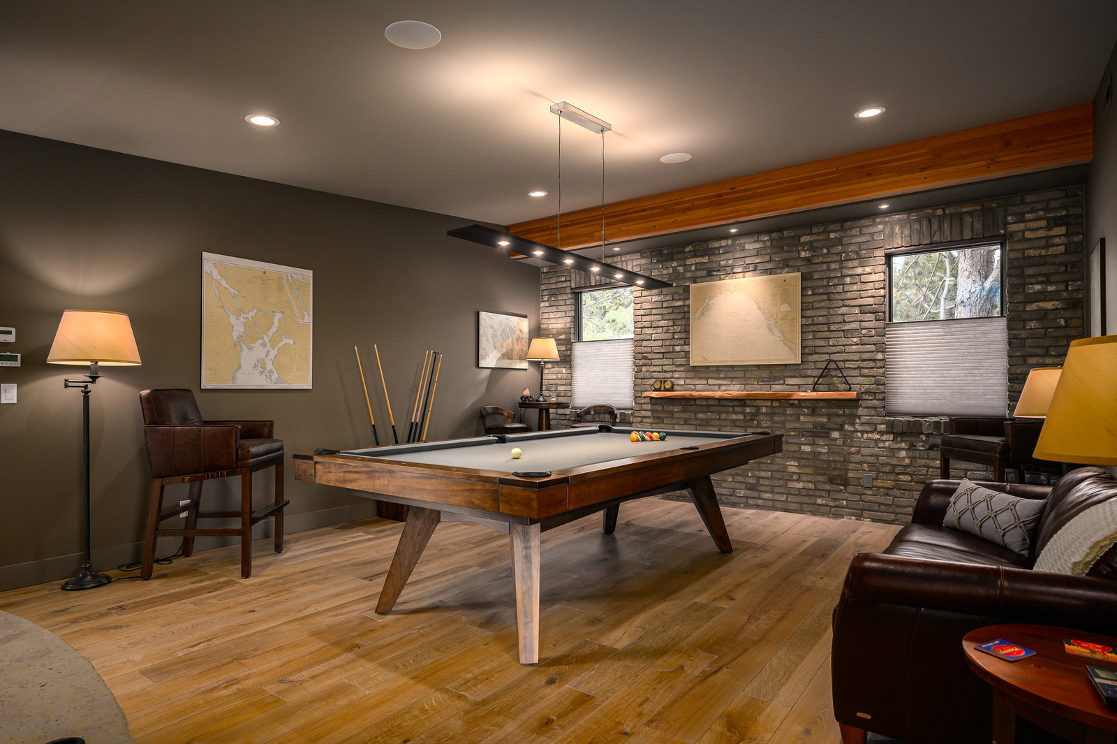 modern basement with pool table