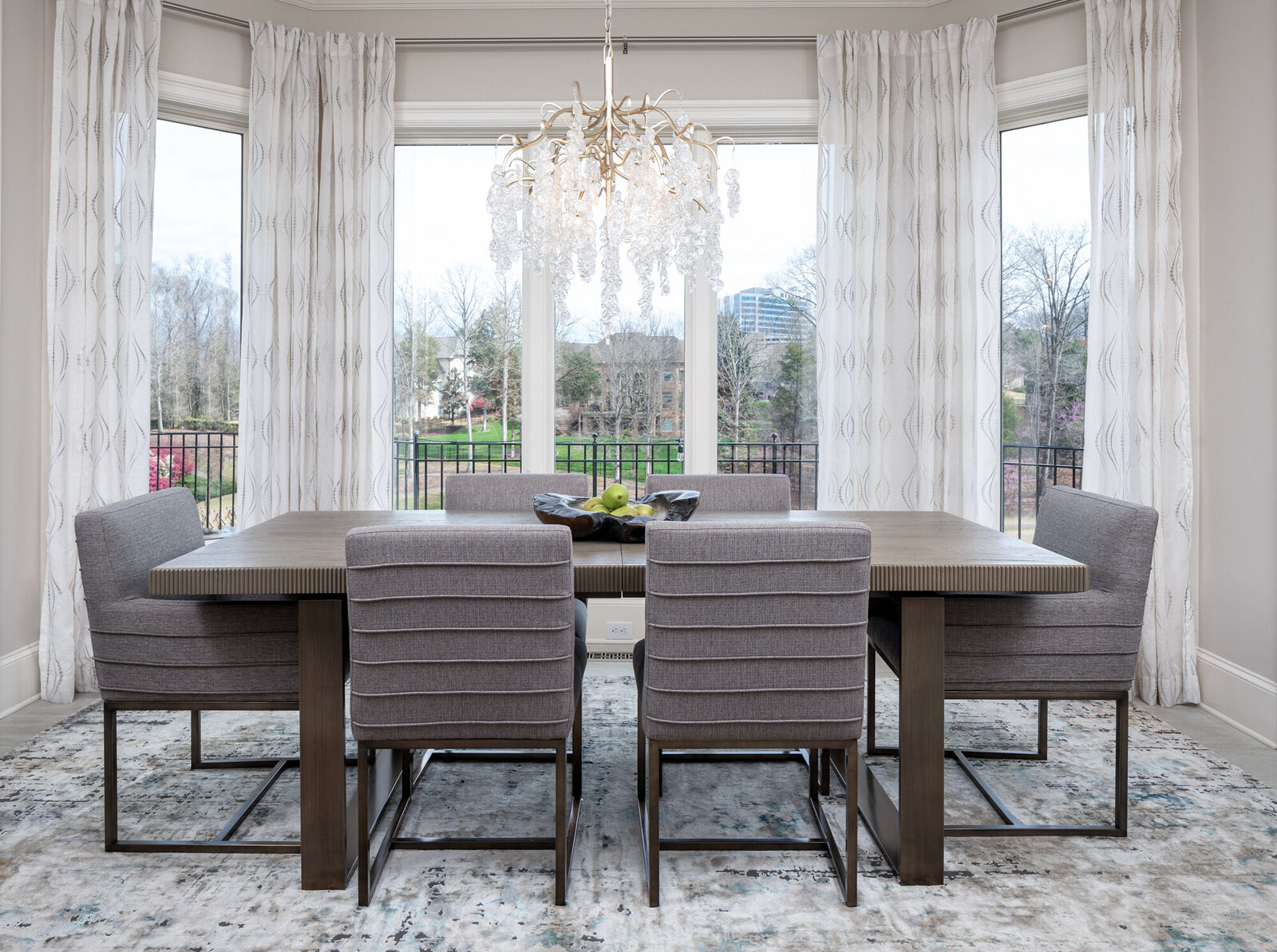 Luxury residential dining room design featuring Universal Furniture. Design by Gracious Home Interiors. Transitional dining room design.