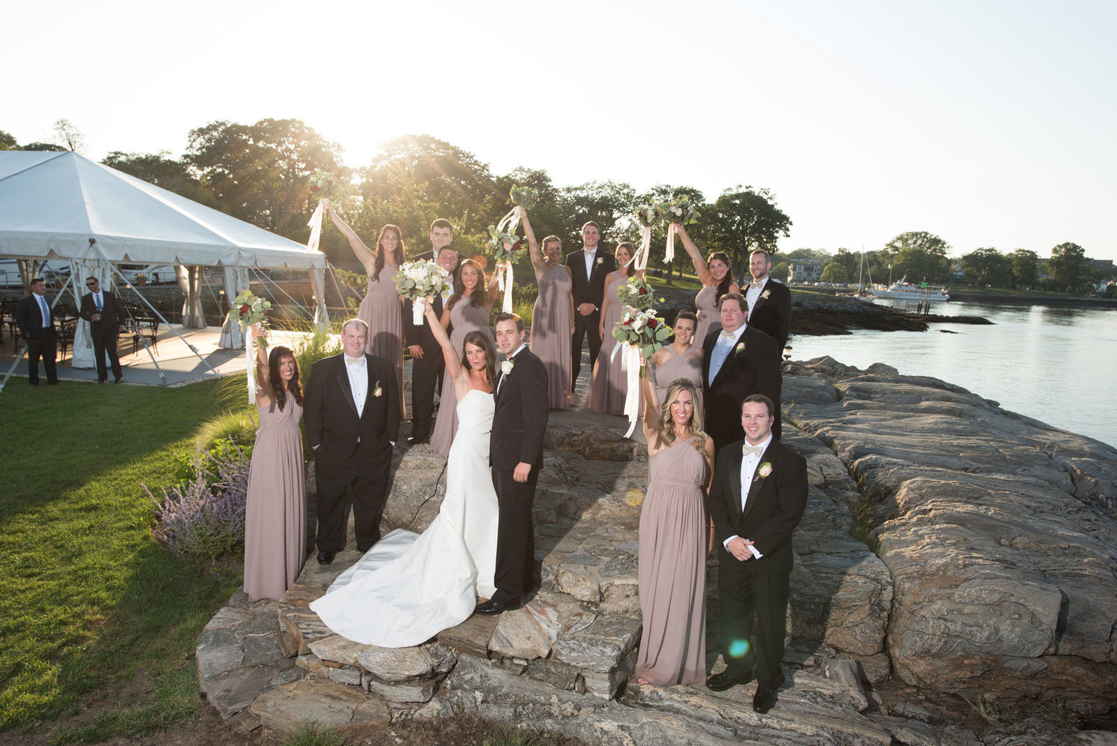 bride and groom with bridal party outside Glen Island Harbor Club