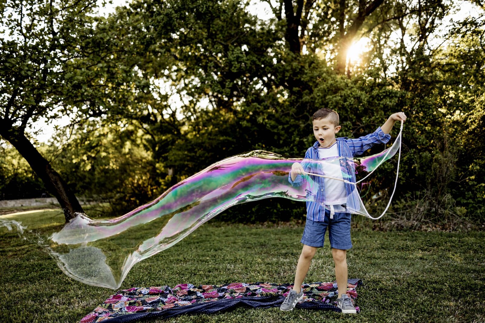 young boy is shocked at his giant bubble in southlake texas