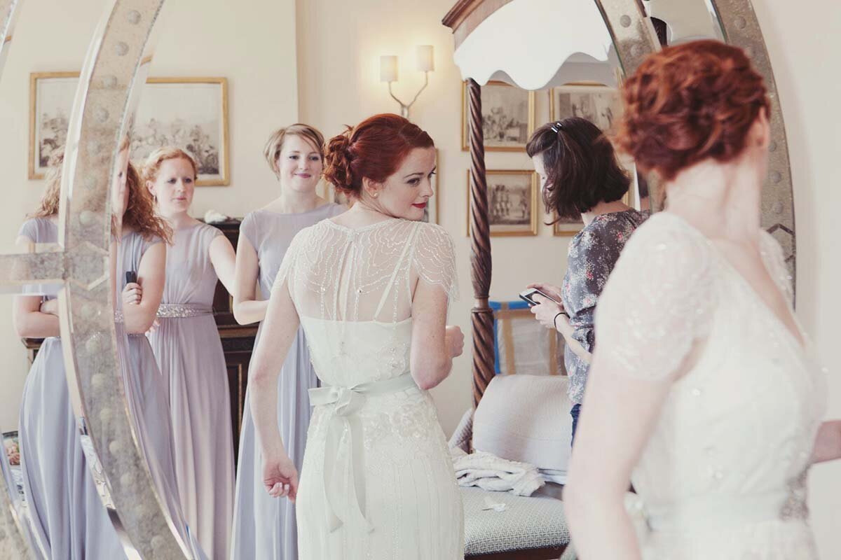 Bride getting ready with bridesmaids at Iscoyd