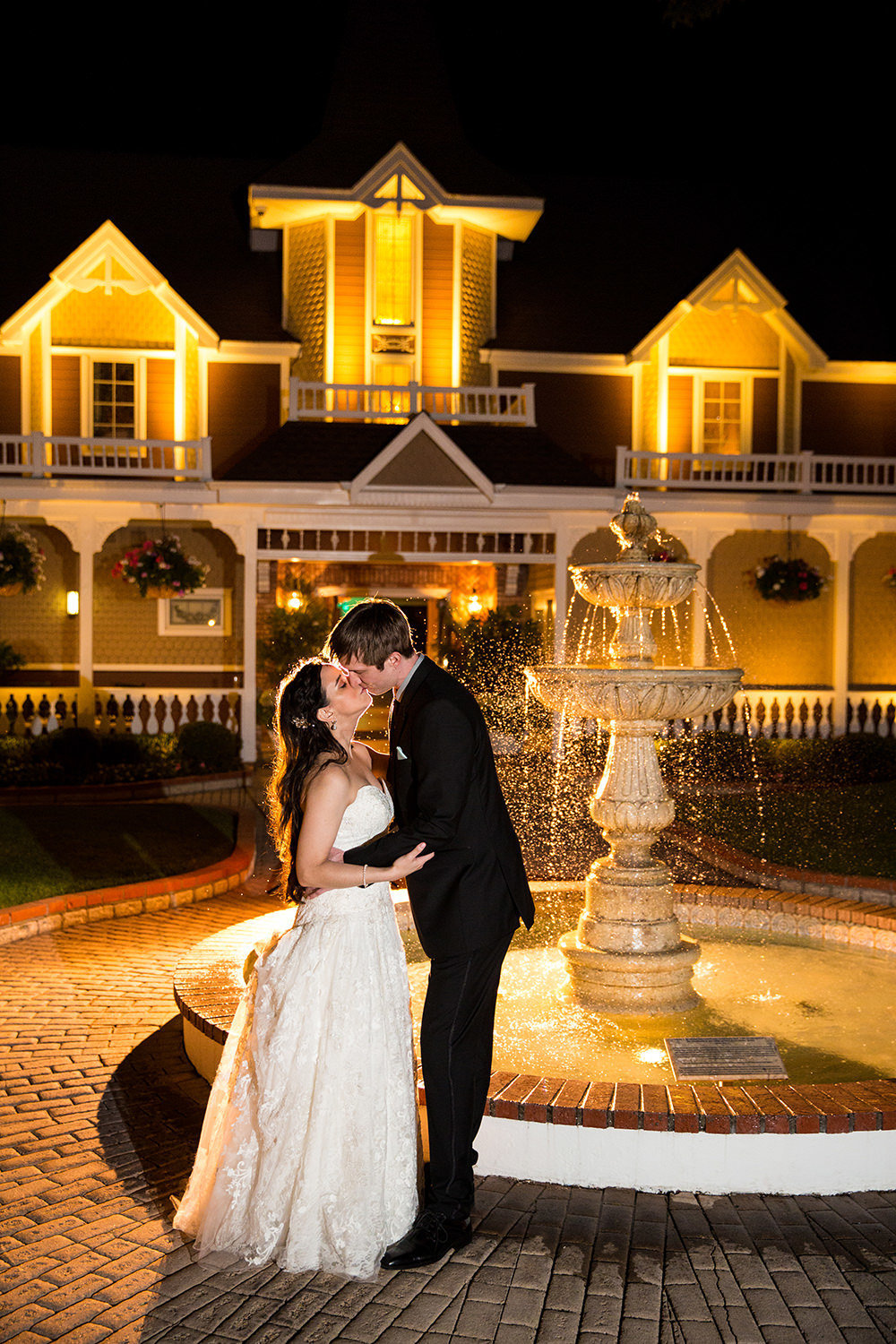 Dramatic night time wedding portrait at the Beverly Mansion