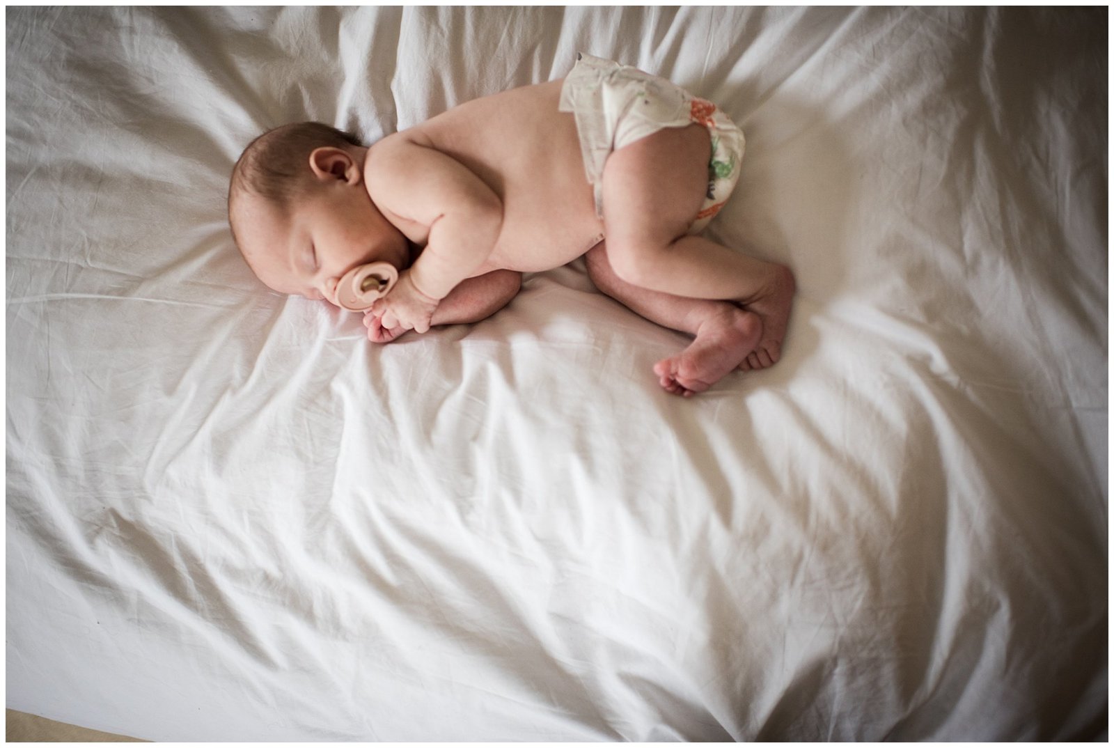 Newborn lifestyle photoshoot baby on side Emily Ann Photography Seattle Photographer