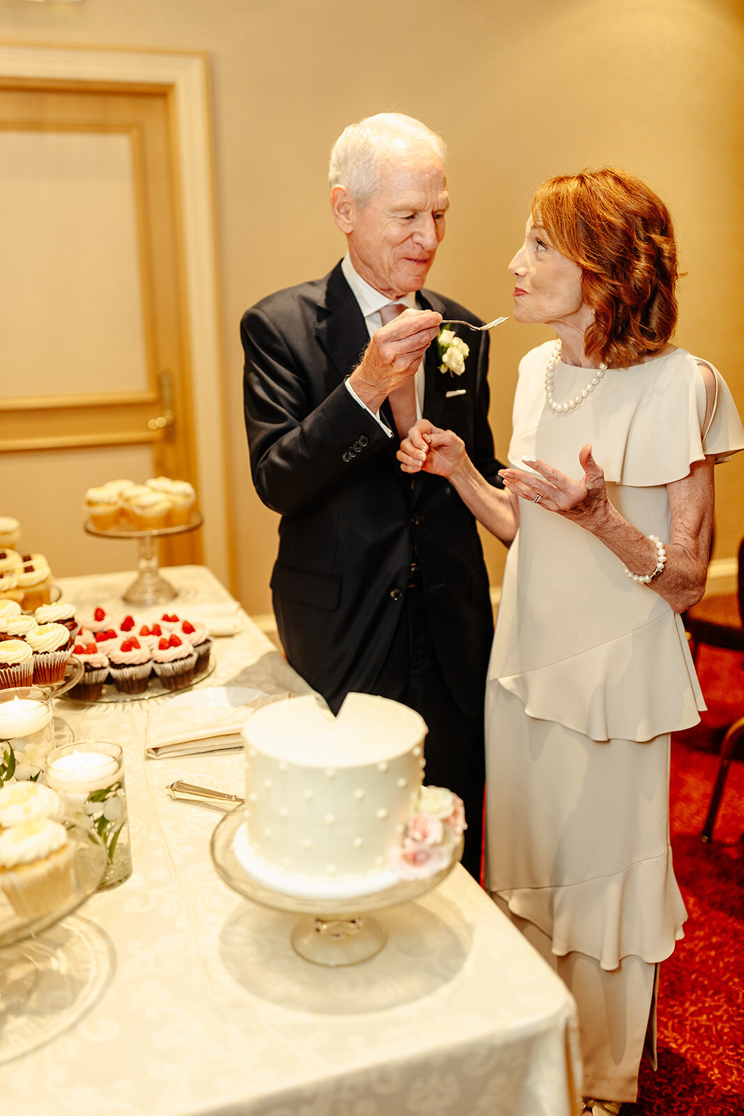 bride-groom-cake-cutting-feeding