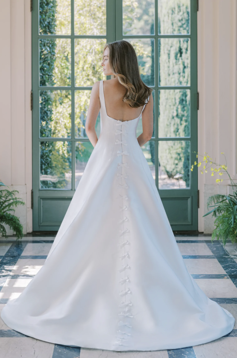 Find modern, fresh styles for debutante and grad gowns in STL.