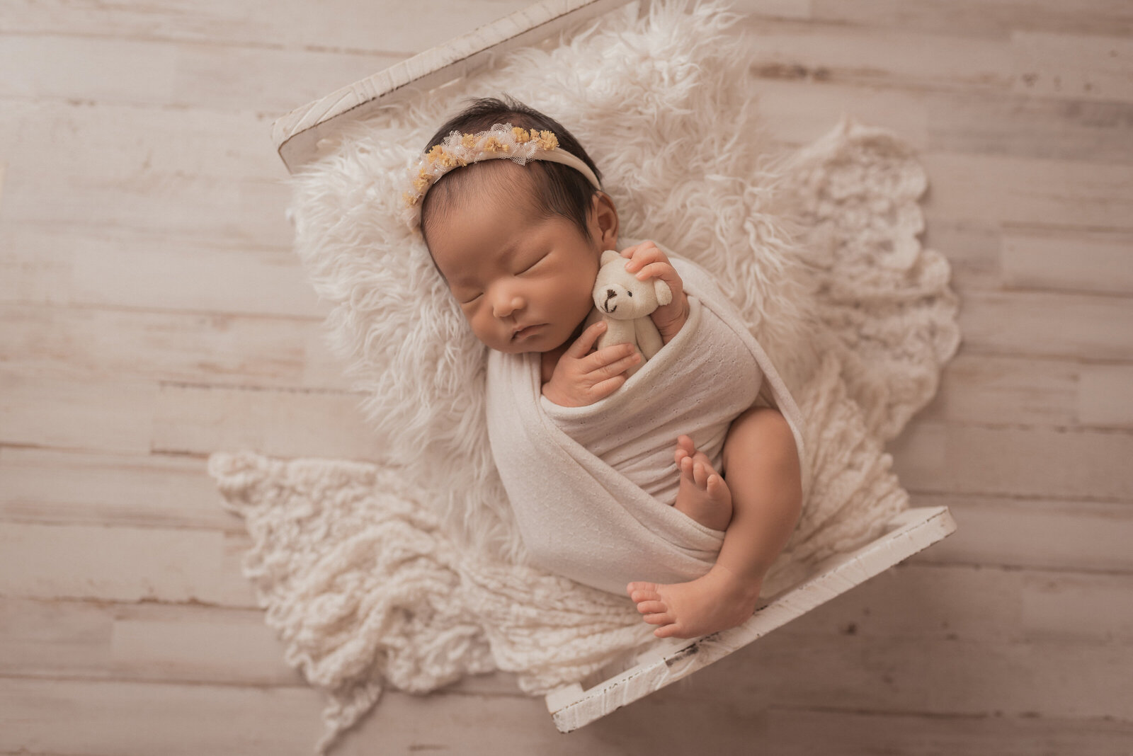 2 week old newborn baby at her newborn portrait session at newborn photography studio in atlanta