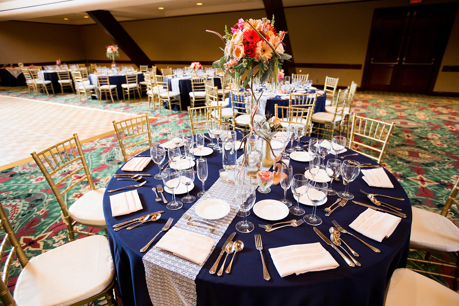 reception table with blue and orange