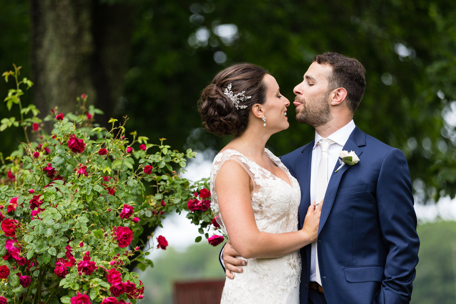 groom is playful with bride during portraits