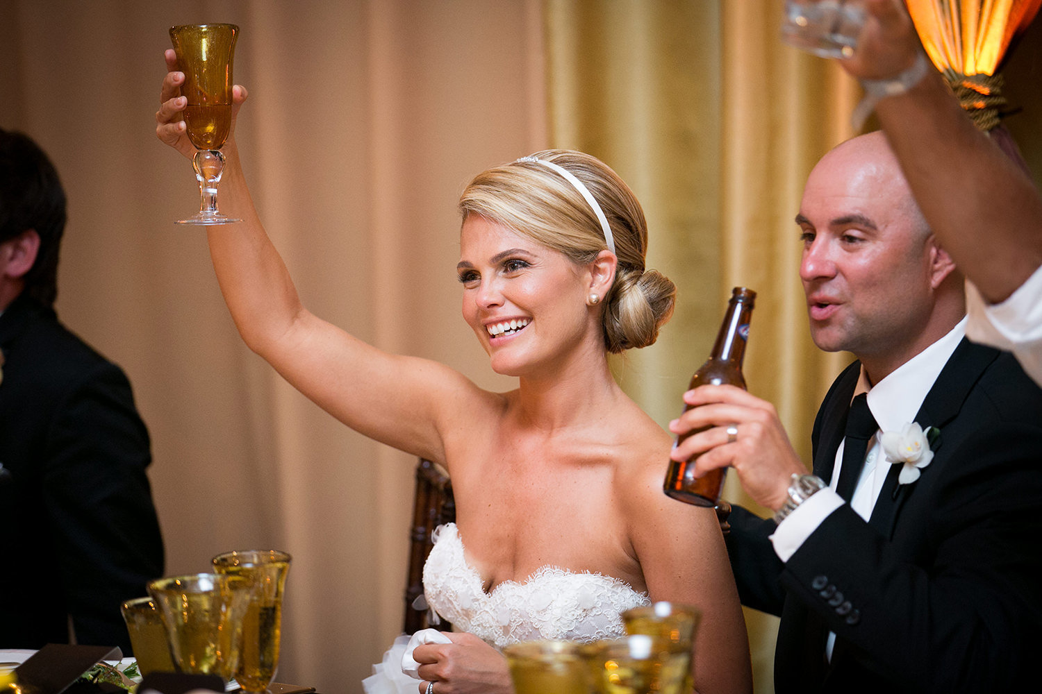 Cheers!  Toasts during the wedding reception at St. Regis Resort\