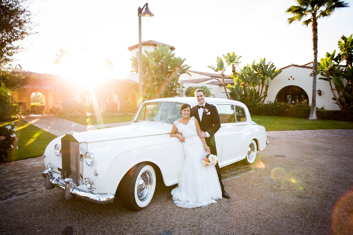 bride and groom at the crosby club beautiful light classic car