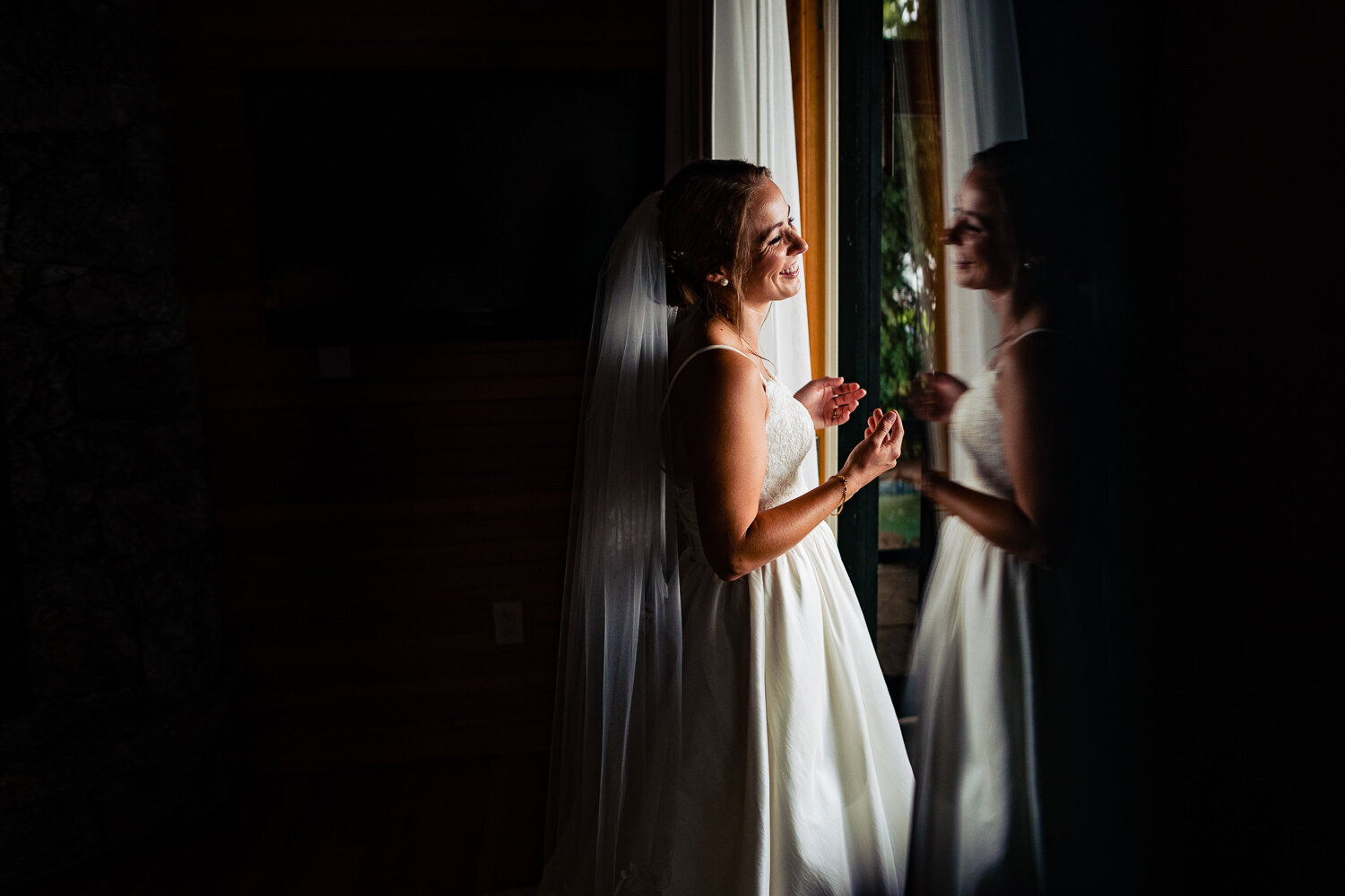 Bride-in-sheer-wedding-dress-with-vail-by-andy-madea-photography copy