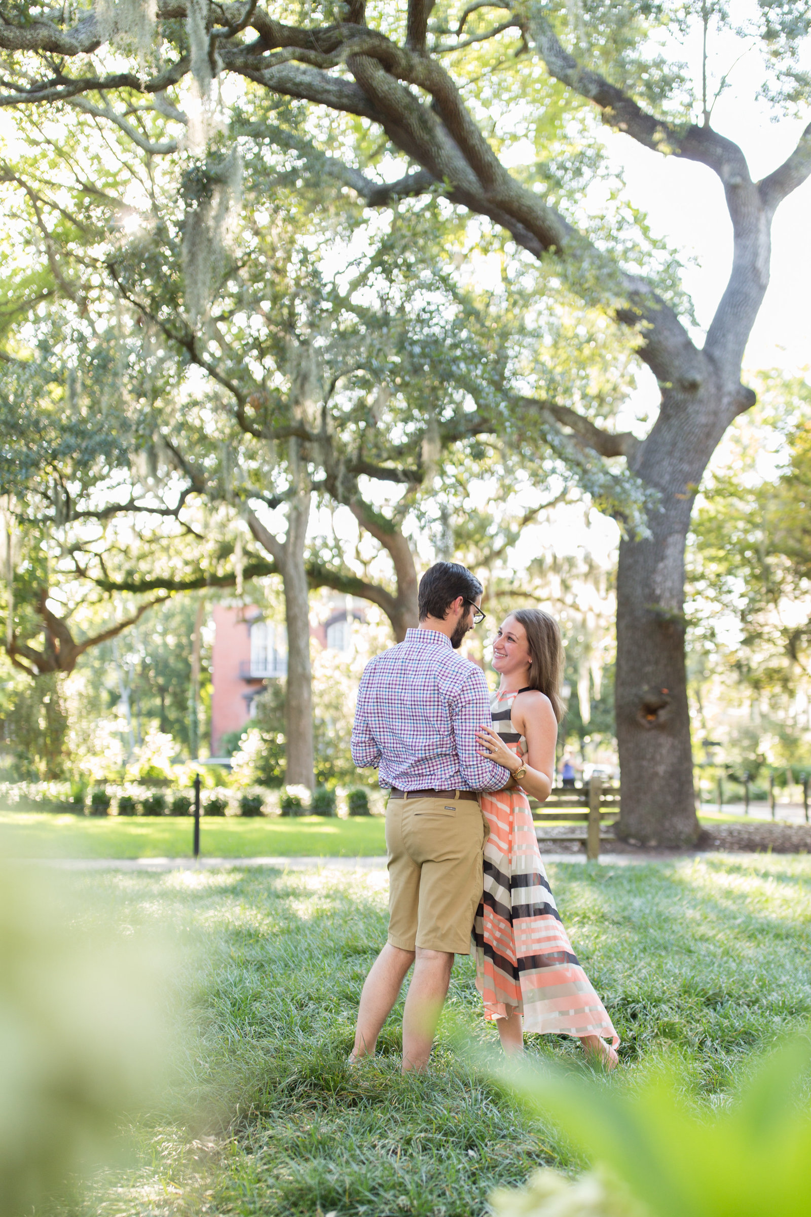 engaged couple at forsyth park in savannah