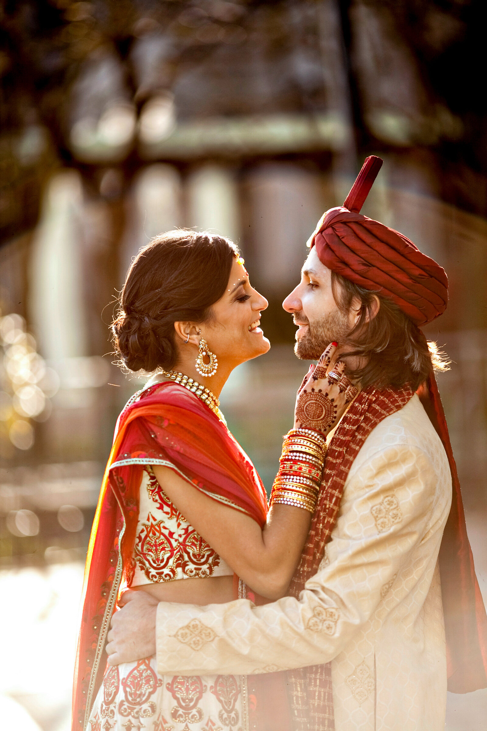 indian bride and groom with red sari