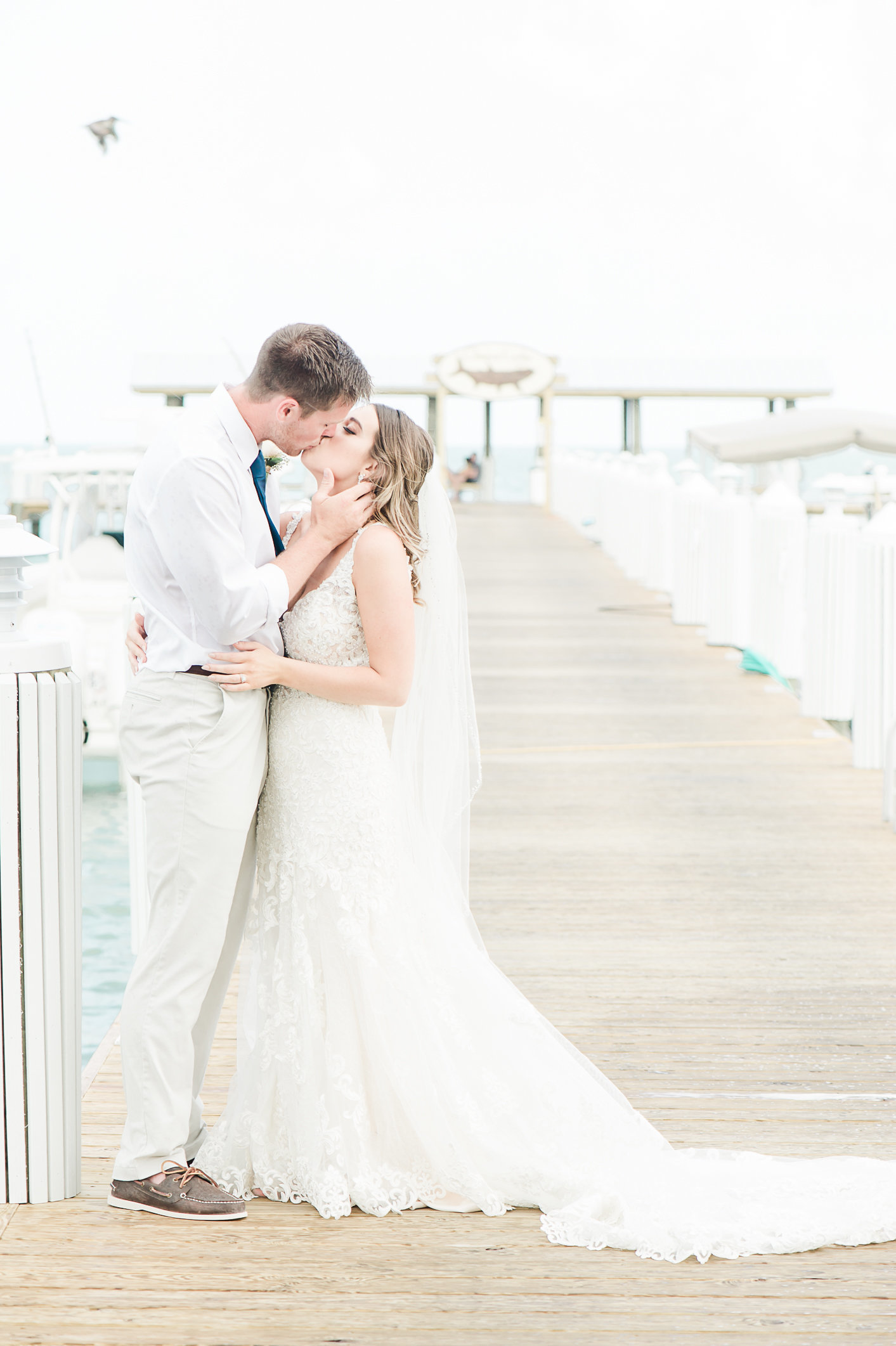 Couple on Pier - Cheeca Wedding - Palm Beach Wedding Photography by Palm Beach Photography, Inc.