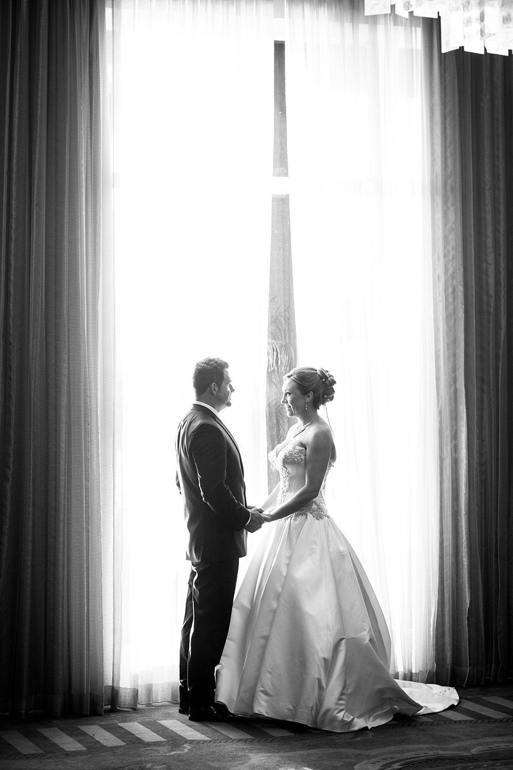 The bride and groom share a private moment after the ceremony | Wedding Photojournalism