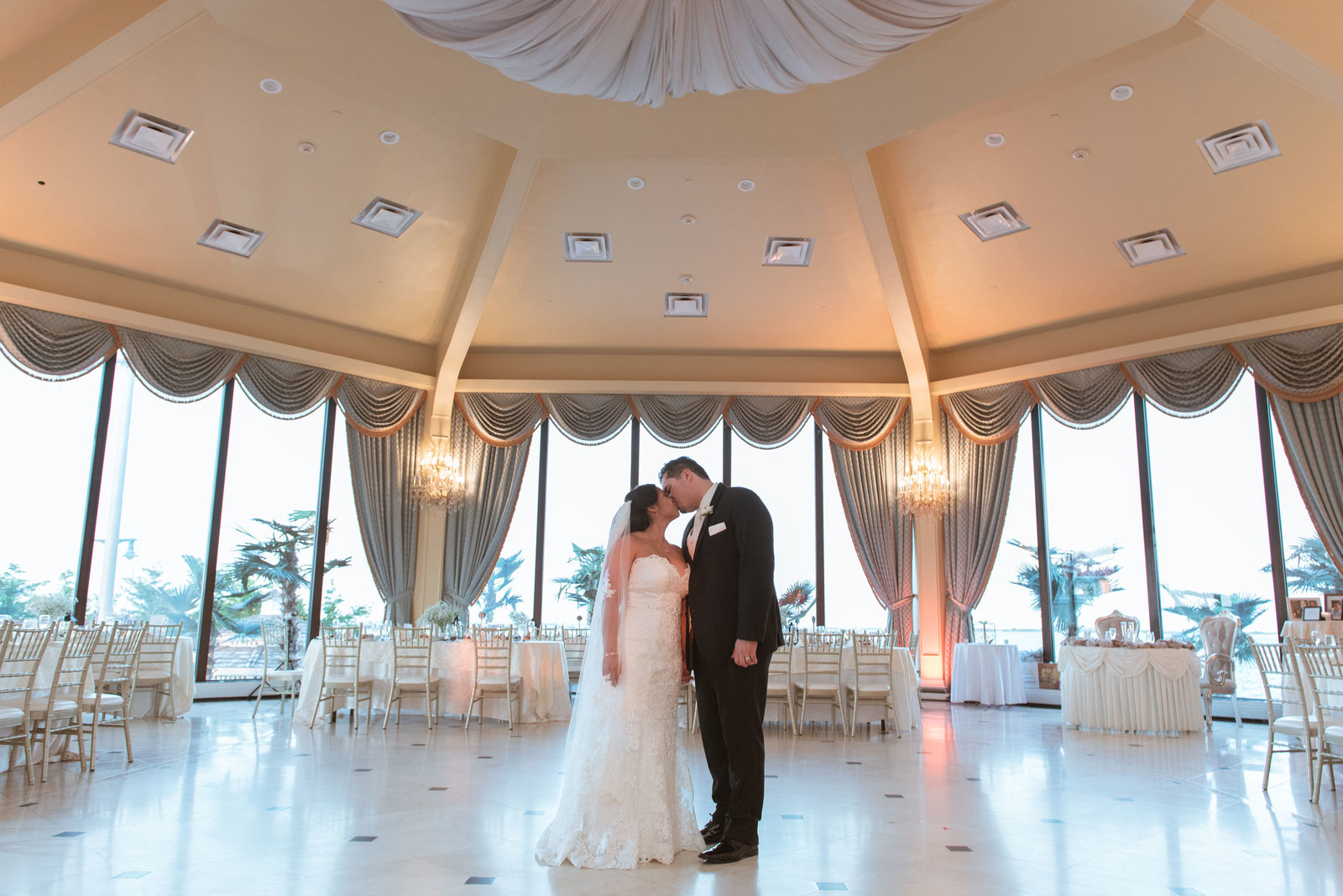Bride and groom in the ballroom at Chateau La Mer