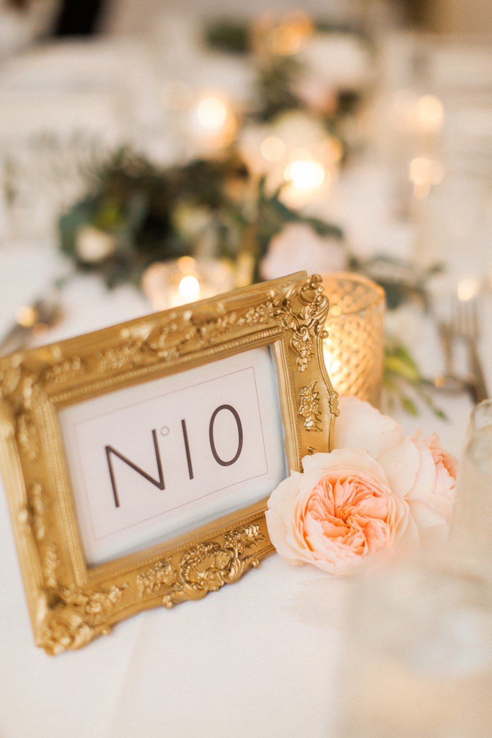 Modern wedding table numbers in gold frames at Belle Mer in Newport, RI